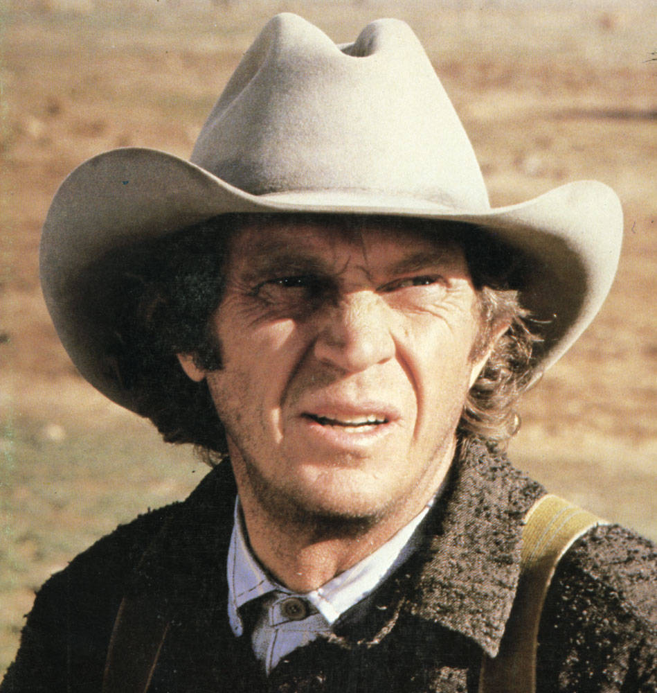 American Actor Steve Mcqueen As Tom Horn Background