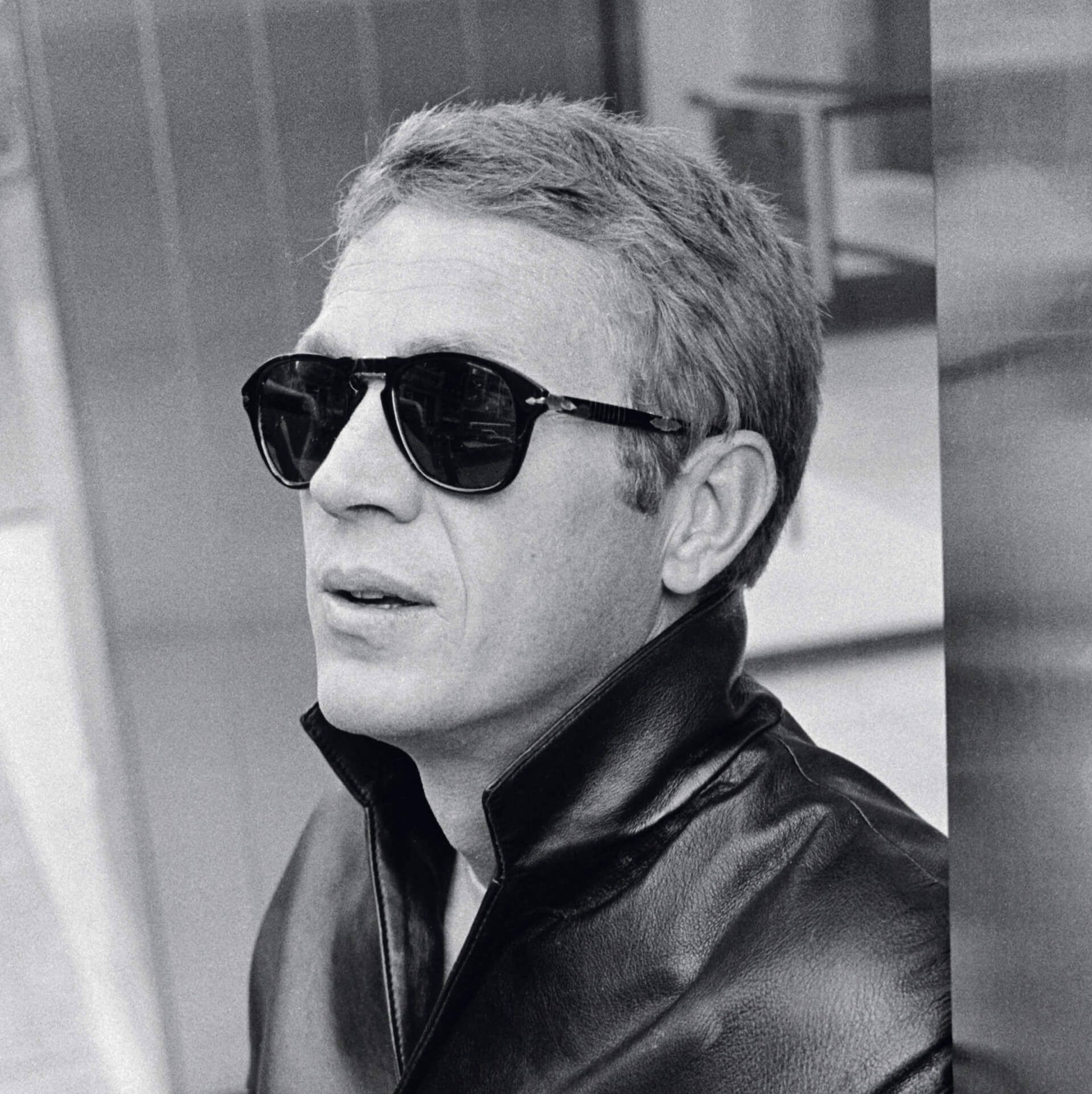 American Actor Steve Mcqueen In Limited Edition Sunglasses Background