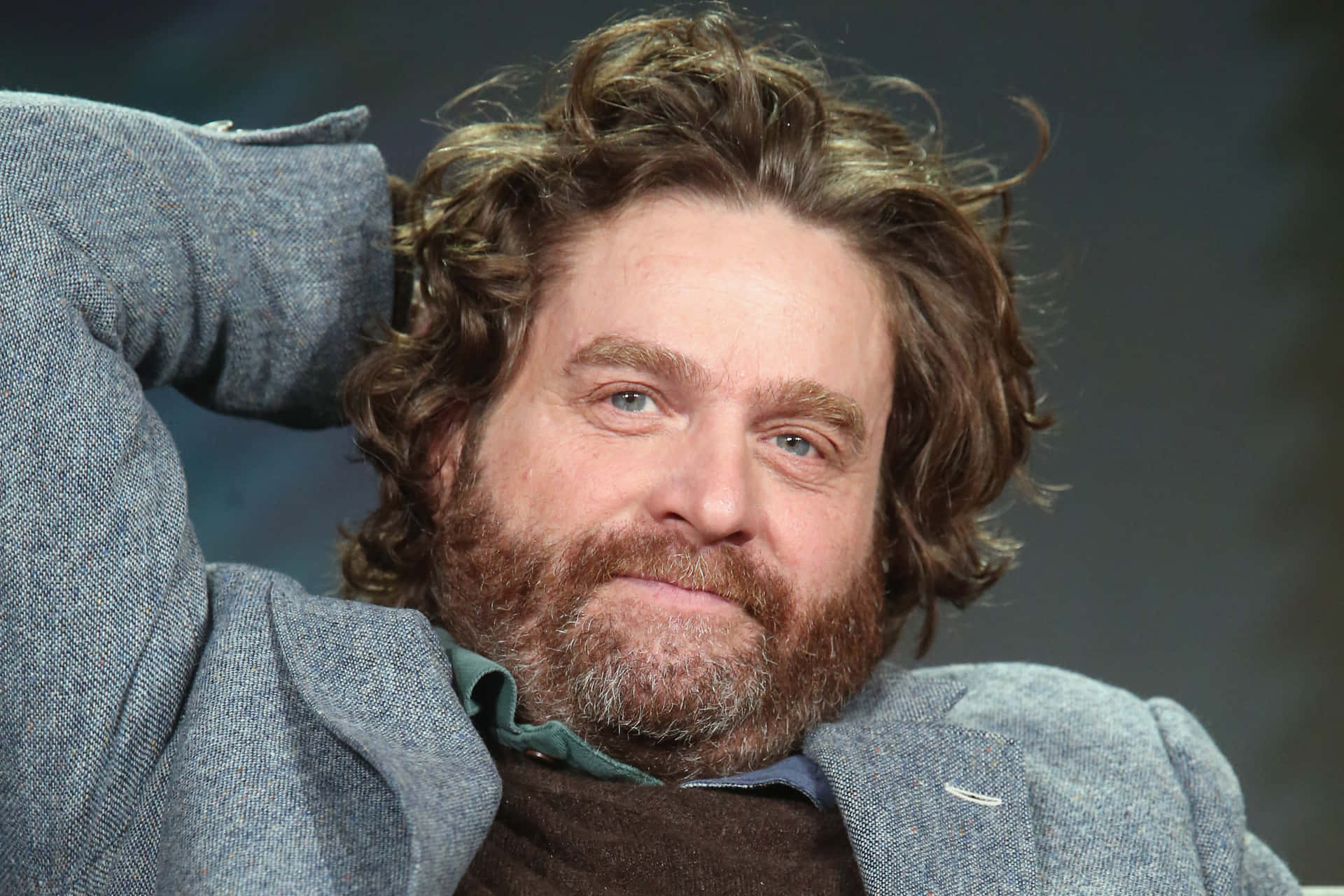 American Actor Zach Galifianakis Smiles Background