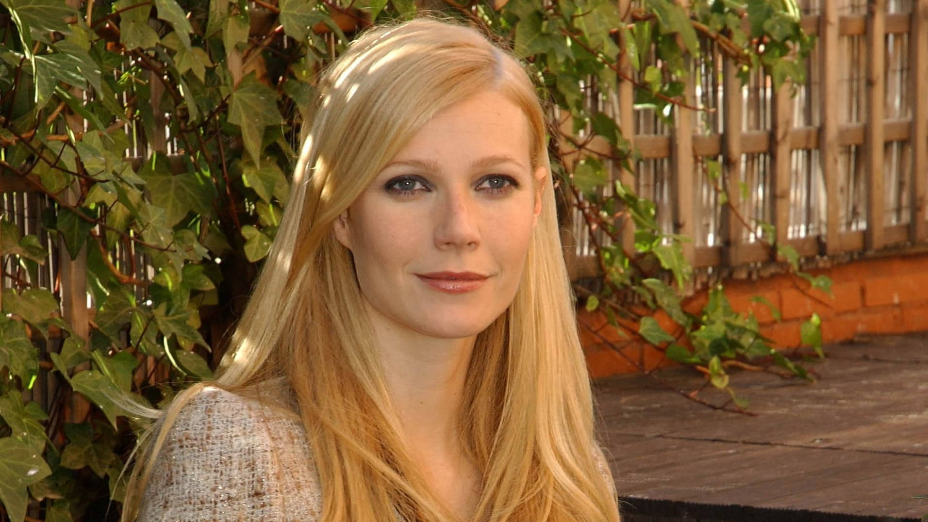 American Actress Gwyneth Paltrow Smiling In Garden