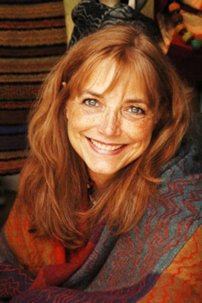 American Actress Karen Allen Showcasing Her Fiber Arts Clothing Line Background