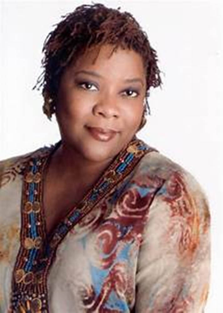 American Actress Loretta Devine In Sisterlocks Portrait Background