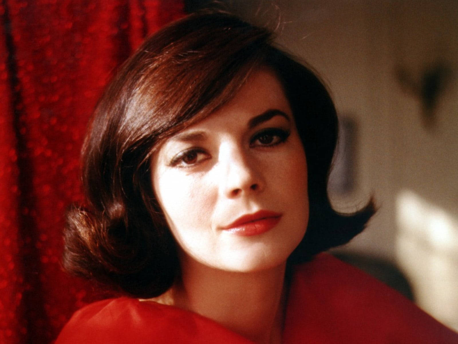 American Actress Natalie Wood In Red Background