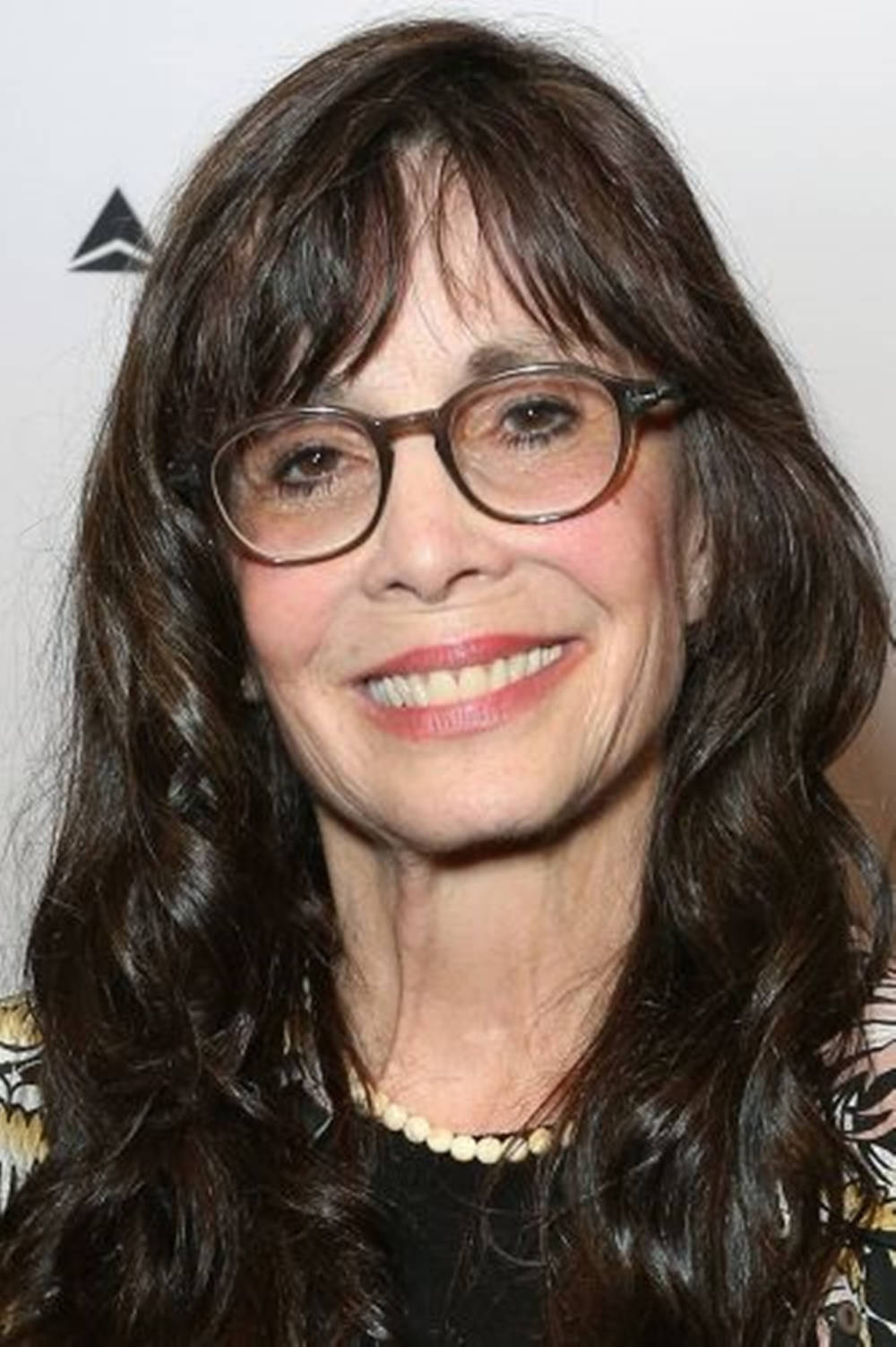 American Actress Talia Shire With Eyeglasses Background