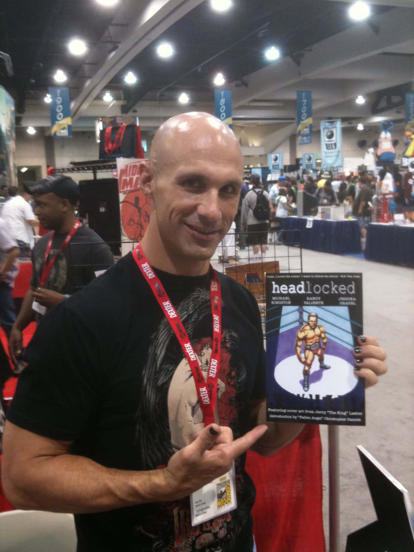 American Aew Wrestler Christopher Daniels Headlocked Comic Convention Background