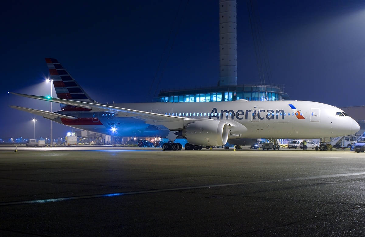 American Airlines Plane At Night Background