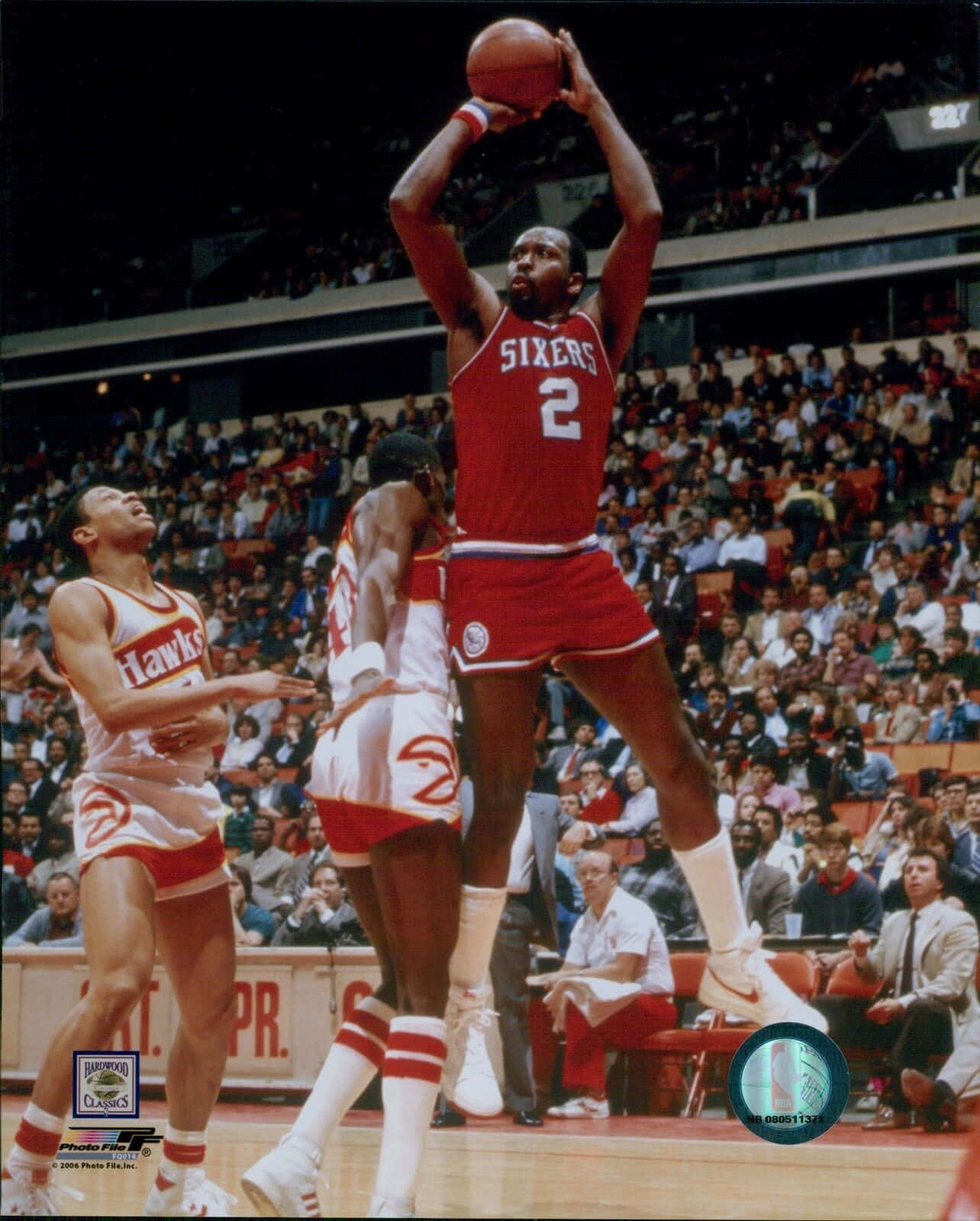 American Athlete Moses Malone Background