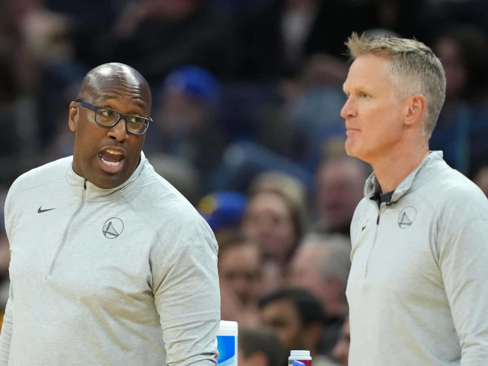 American Basketball Coach Mike Brown With Steve Kerr Background