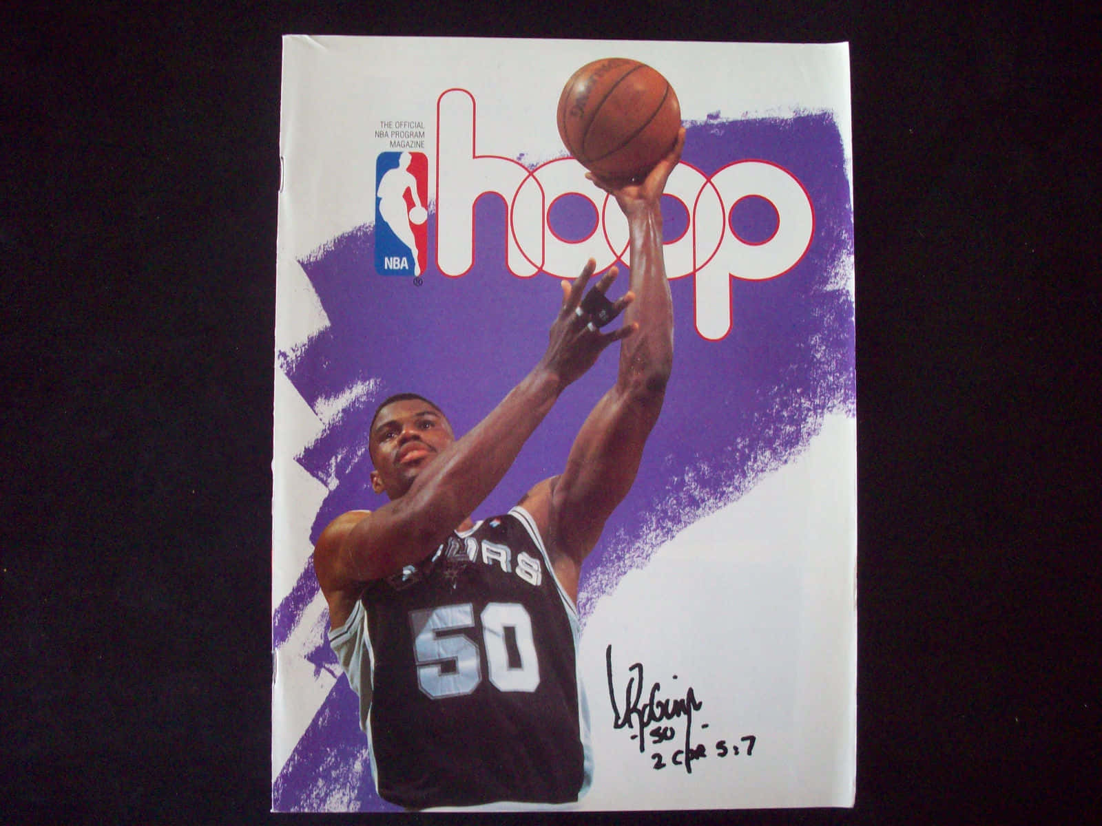 American Basketball Legend David Robinson Executing A Spectacular Dunk. Background