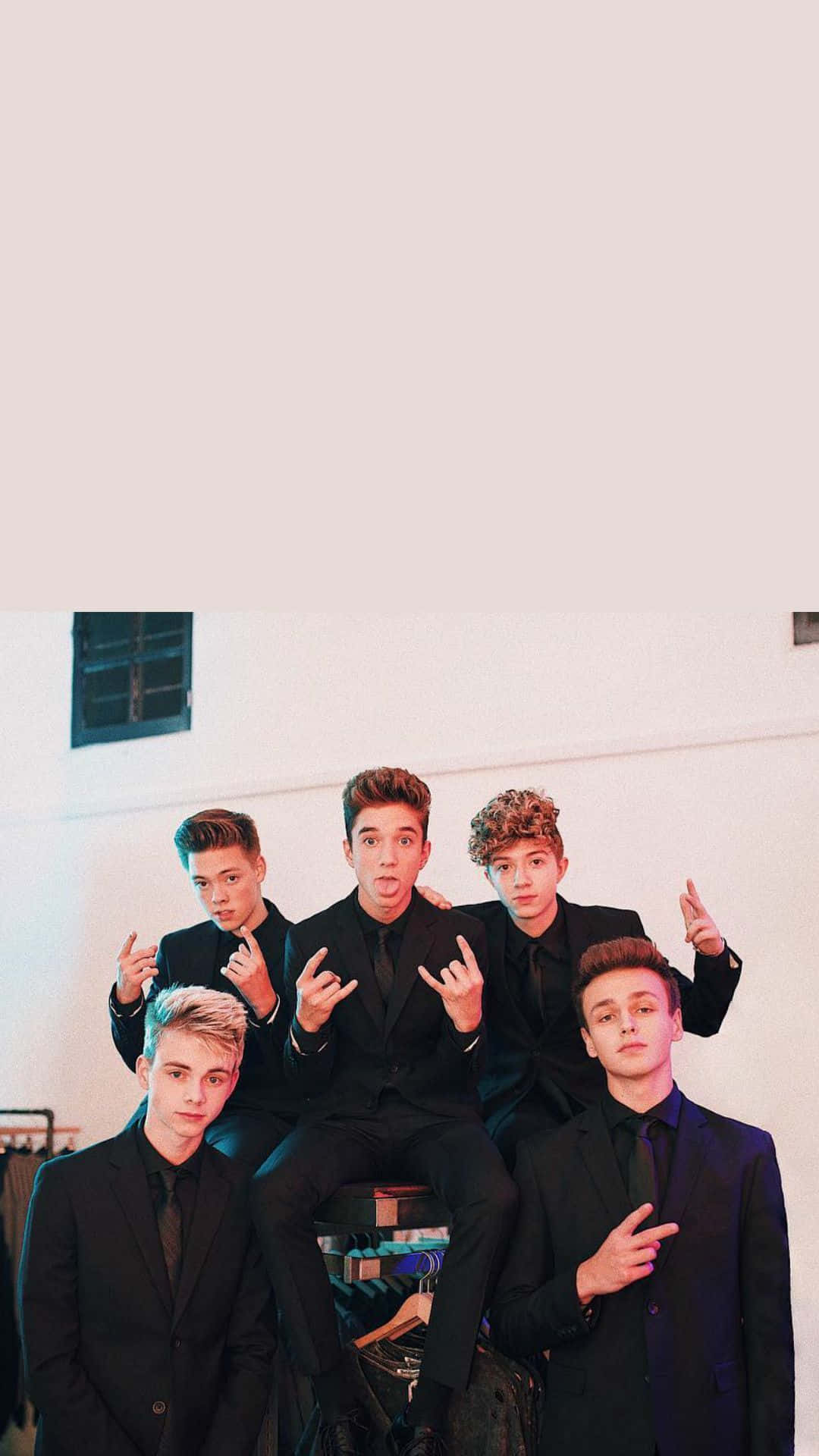 American Boy Band Why Don't We Wearing Black Suits Background