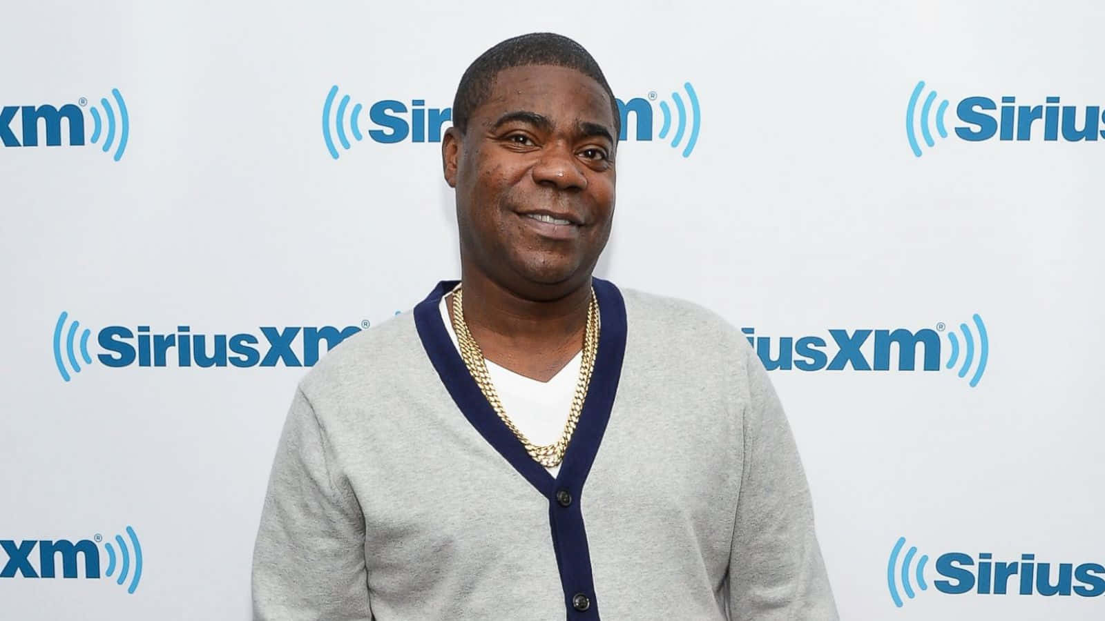 American Comedian And Actor Tracy Morgan Posing For A Photo Background