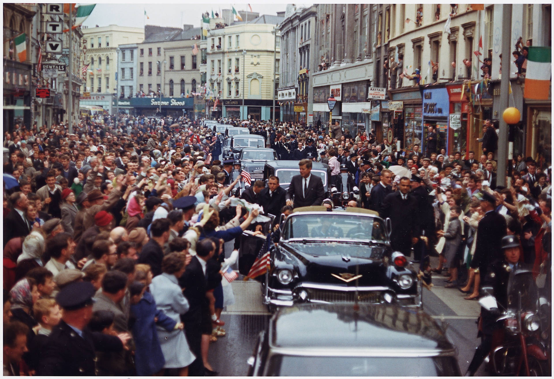 American Crowd And John F. Kennedy Background