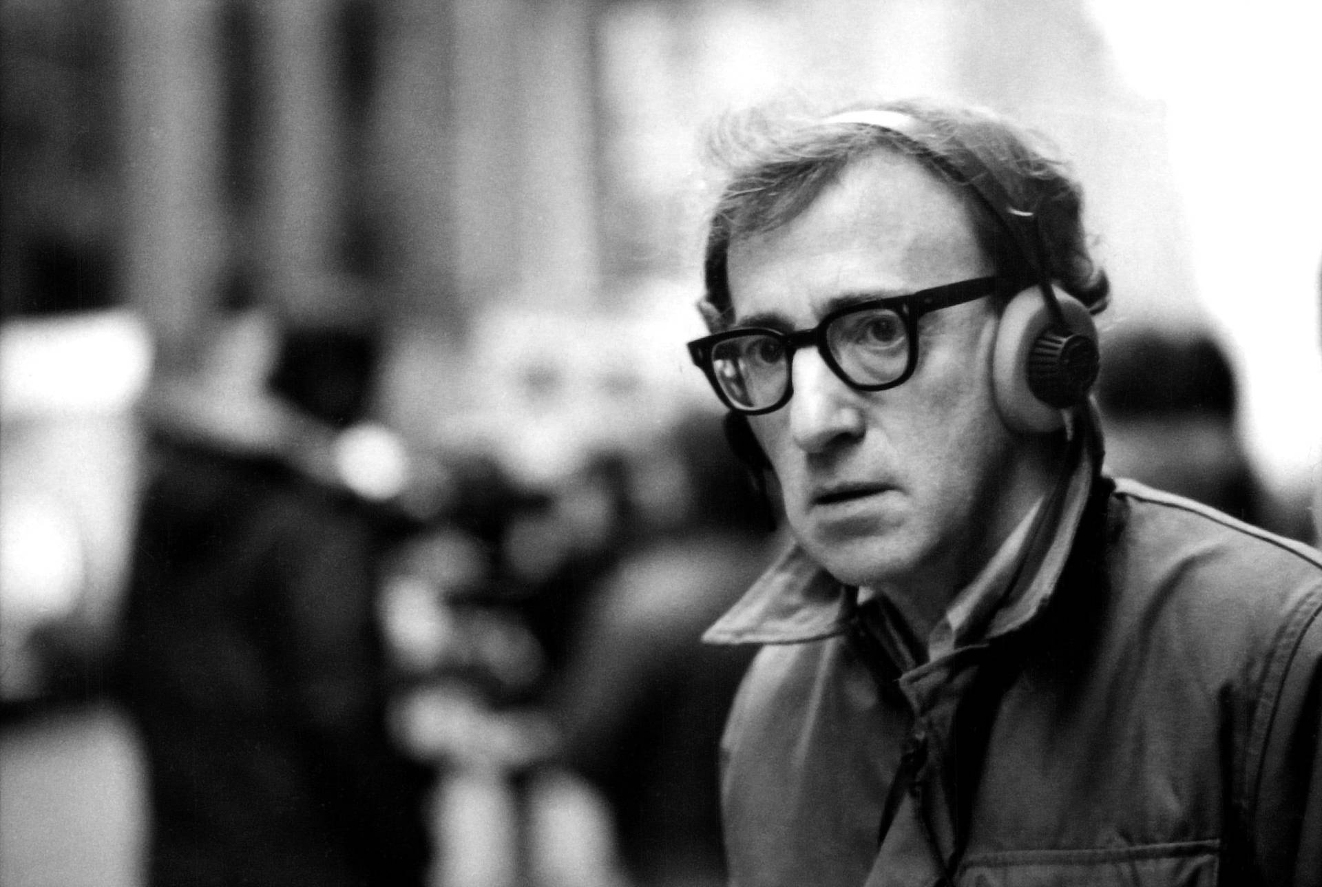 American Filmmaker Woody Allen Cinematic Greyscale Portrait Background