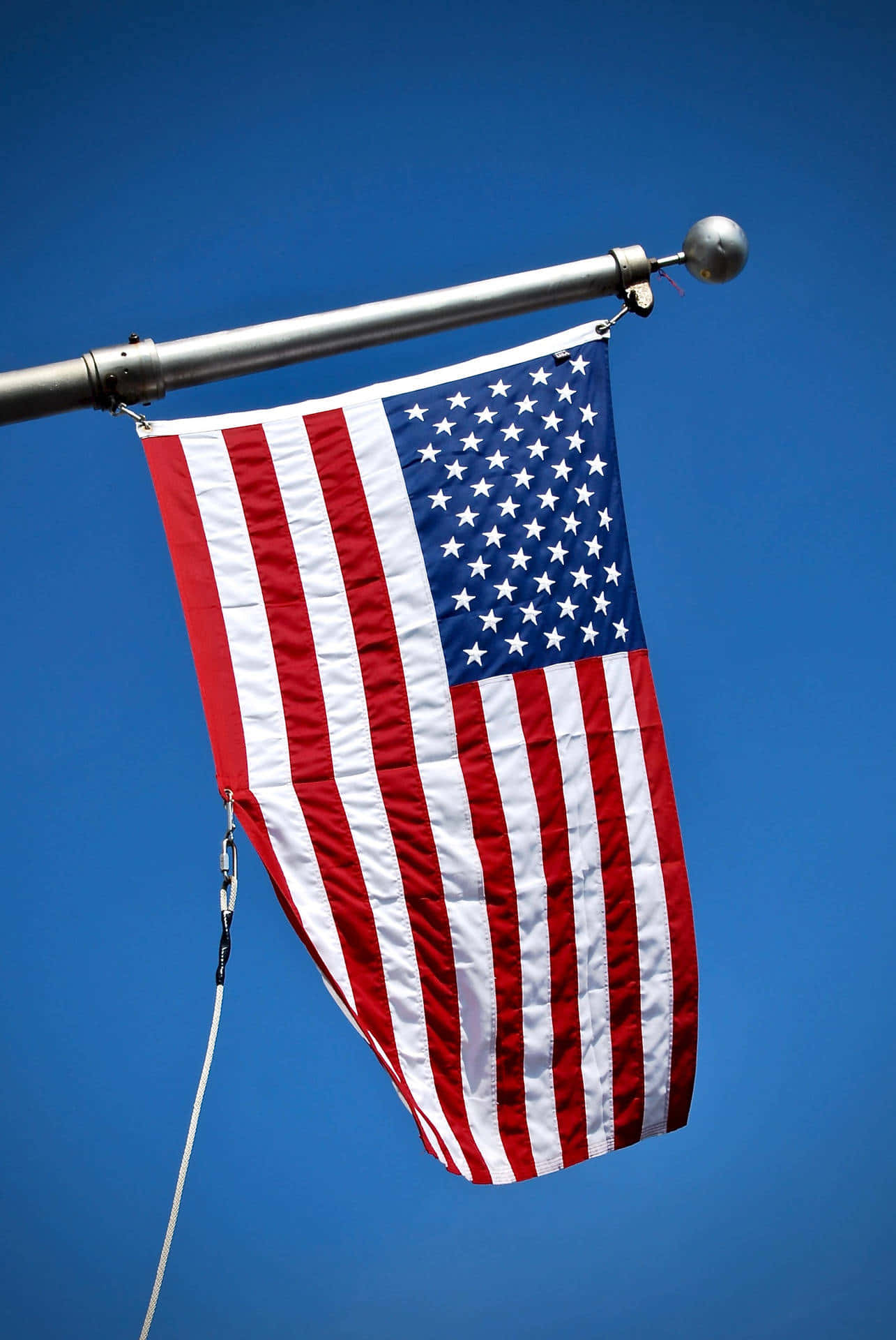 American Flag Against Blue Sky