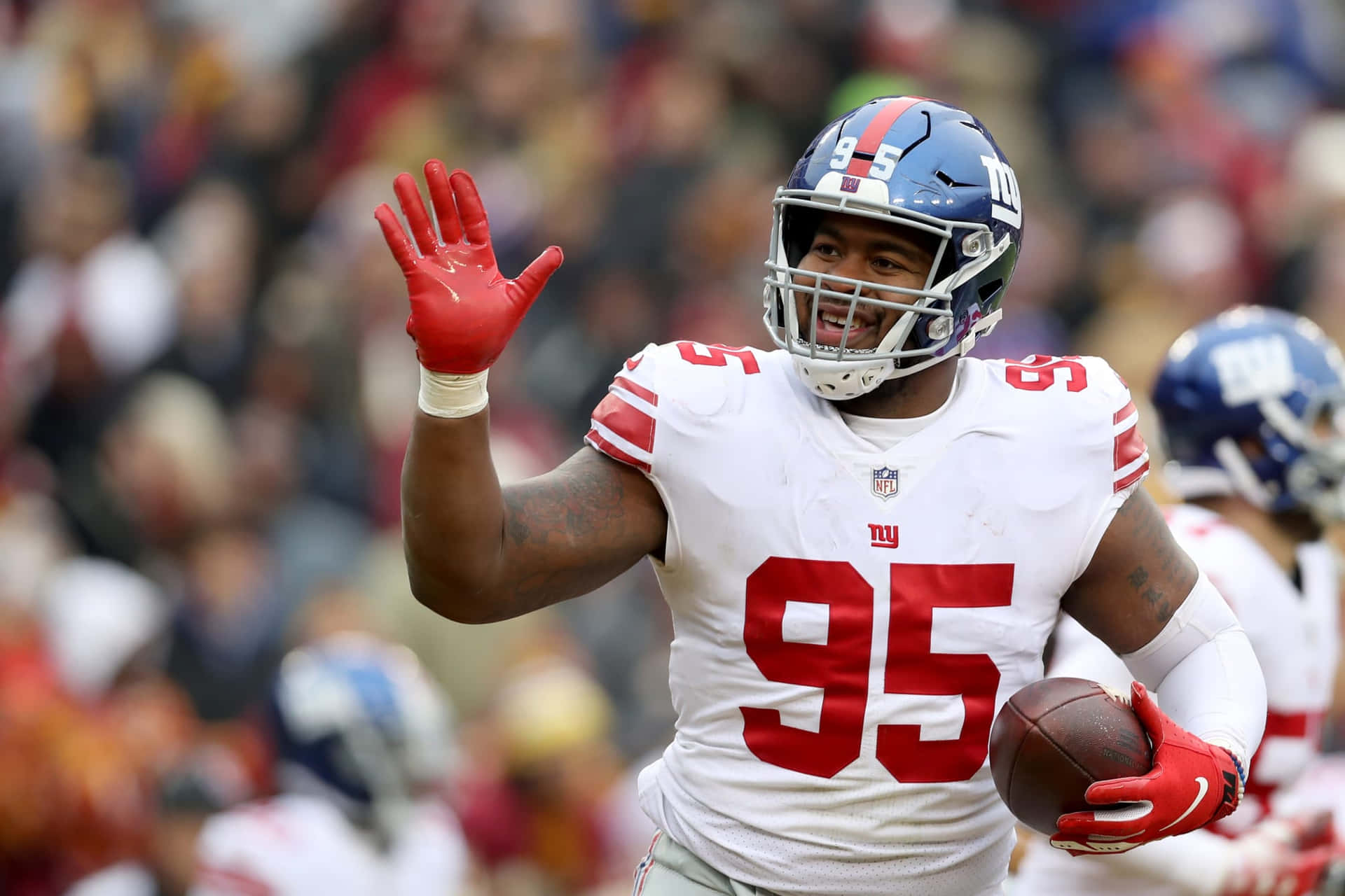 American Football Defensive Player Bj Hill Celebrating 2018 Game Background
