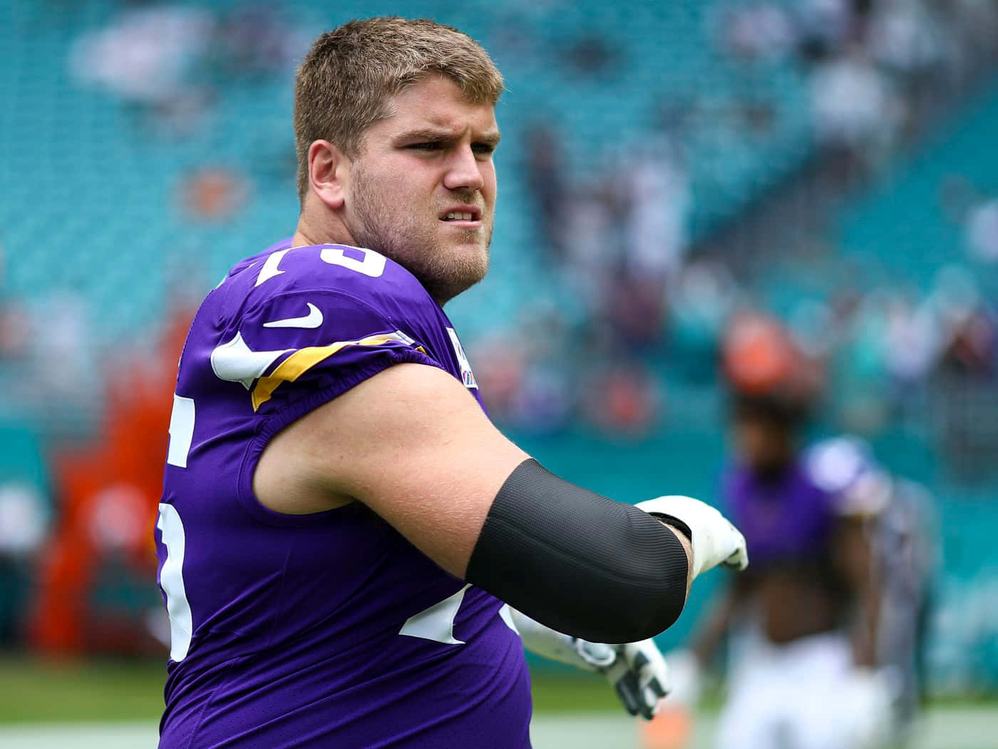 American Football Player Brian O'neill Stretching Background