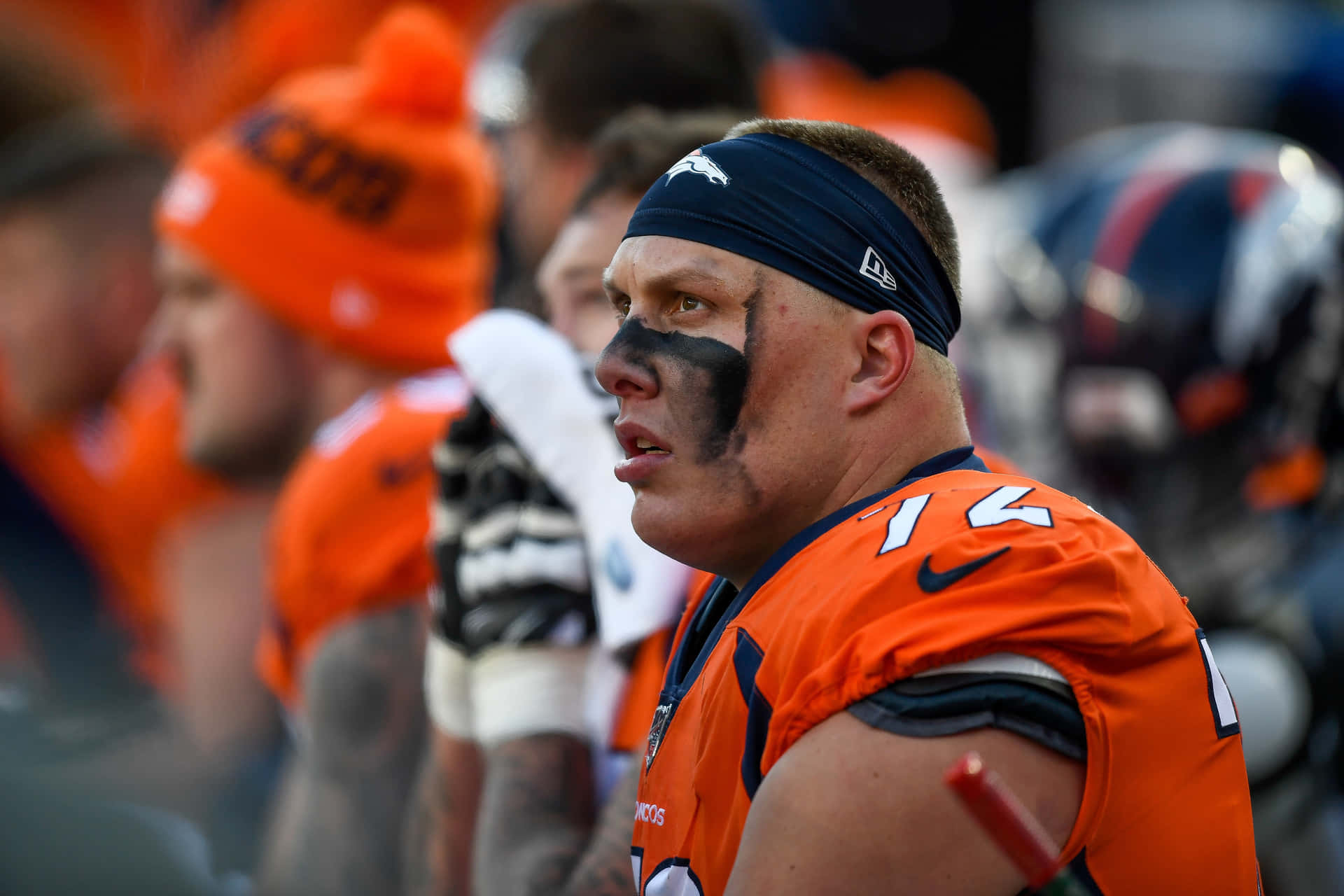 American Football Player Garett Bolles With Eye Black Background