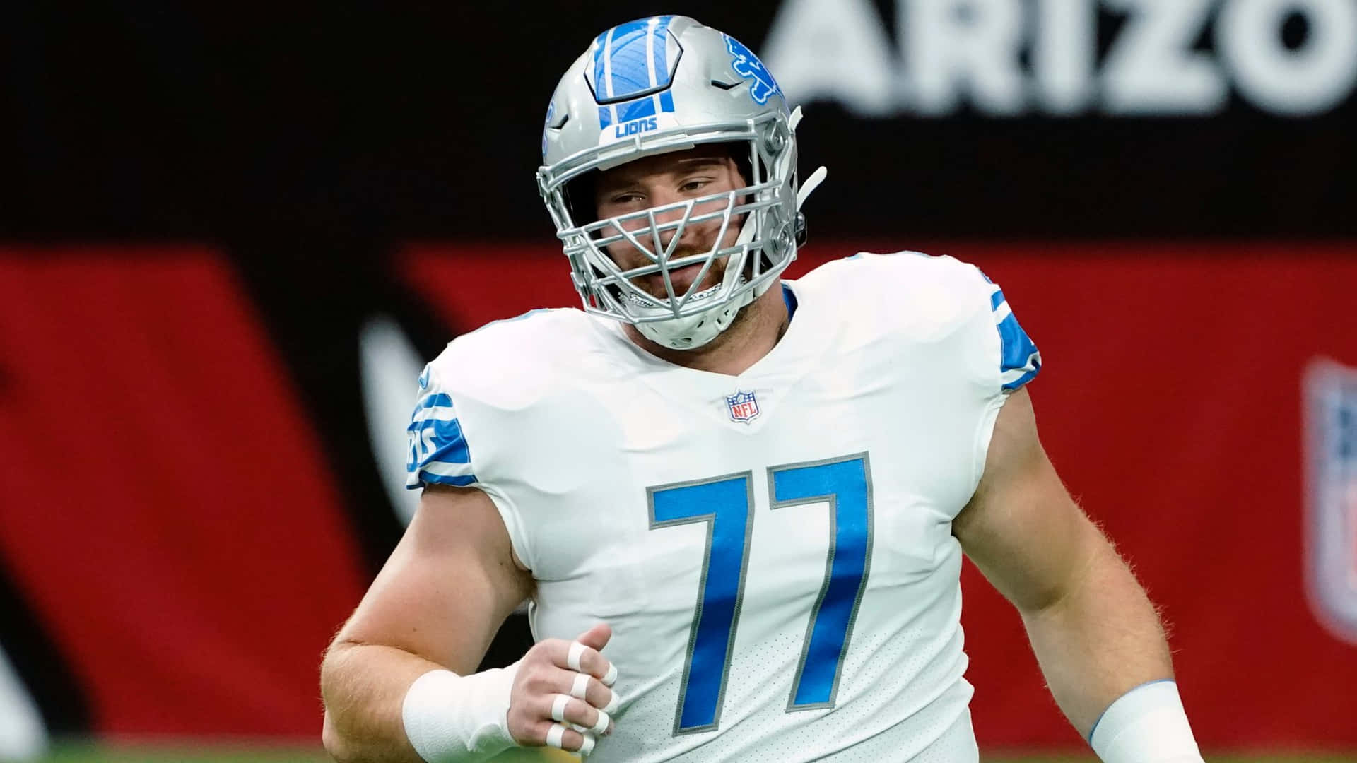 American Football Player No. 77 Frank Ragnow Background