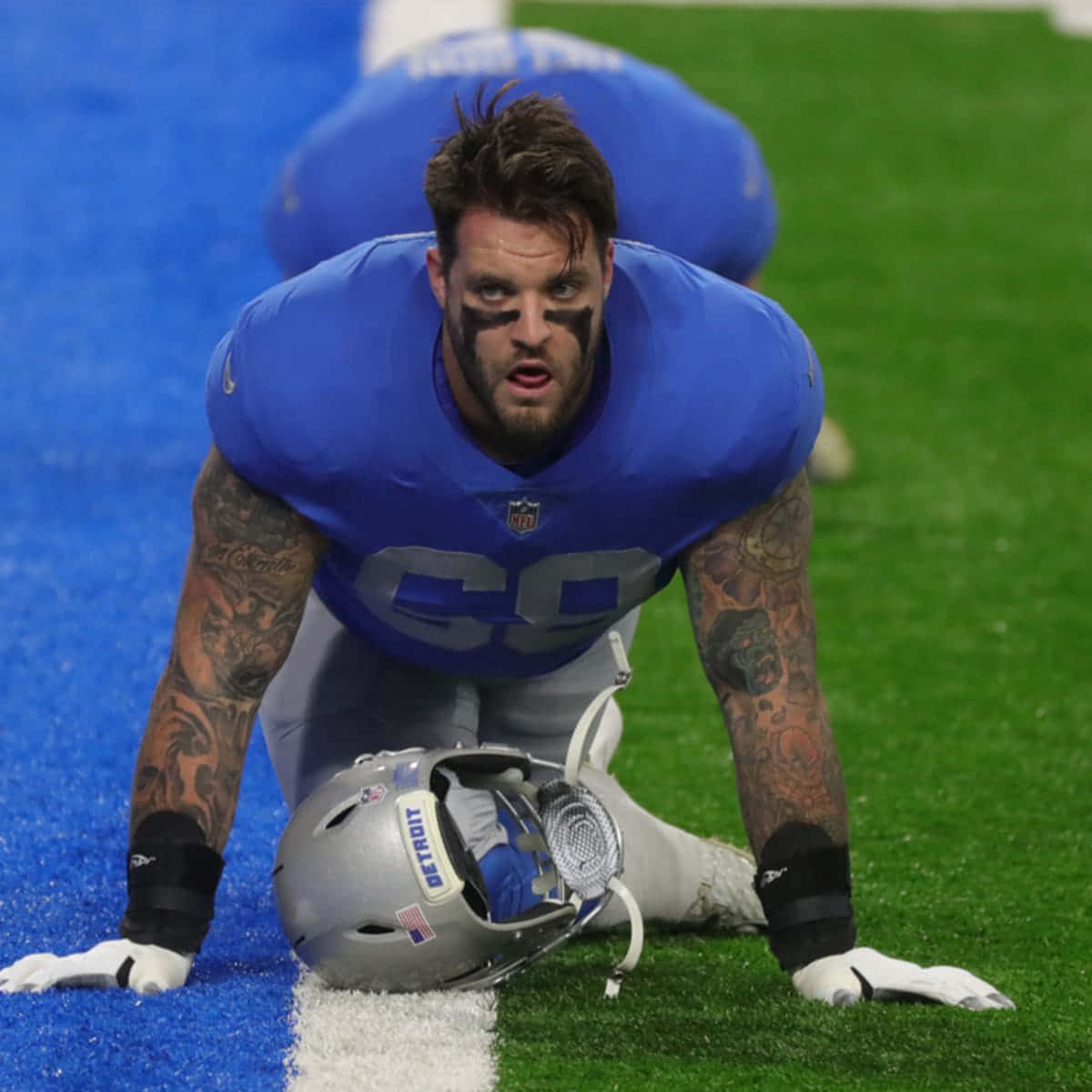 American Football Star Athlete Taylor Decker Background