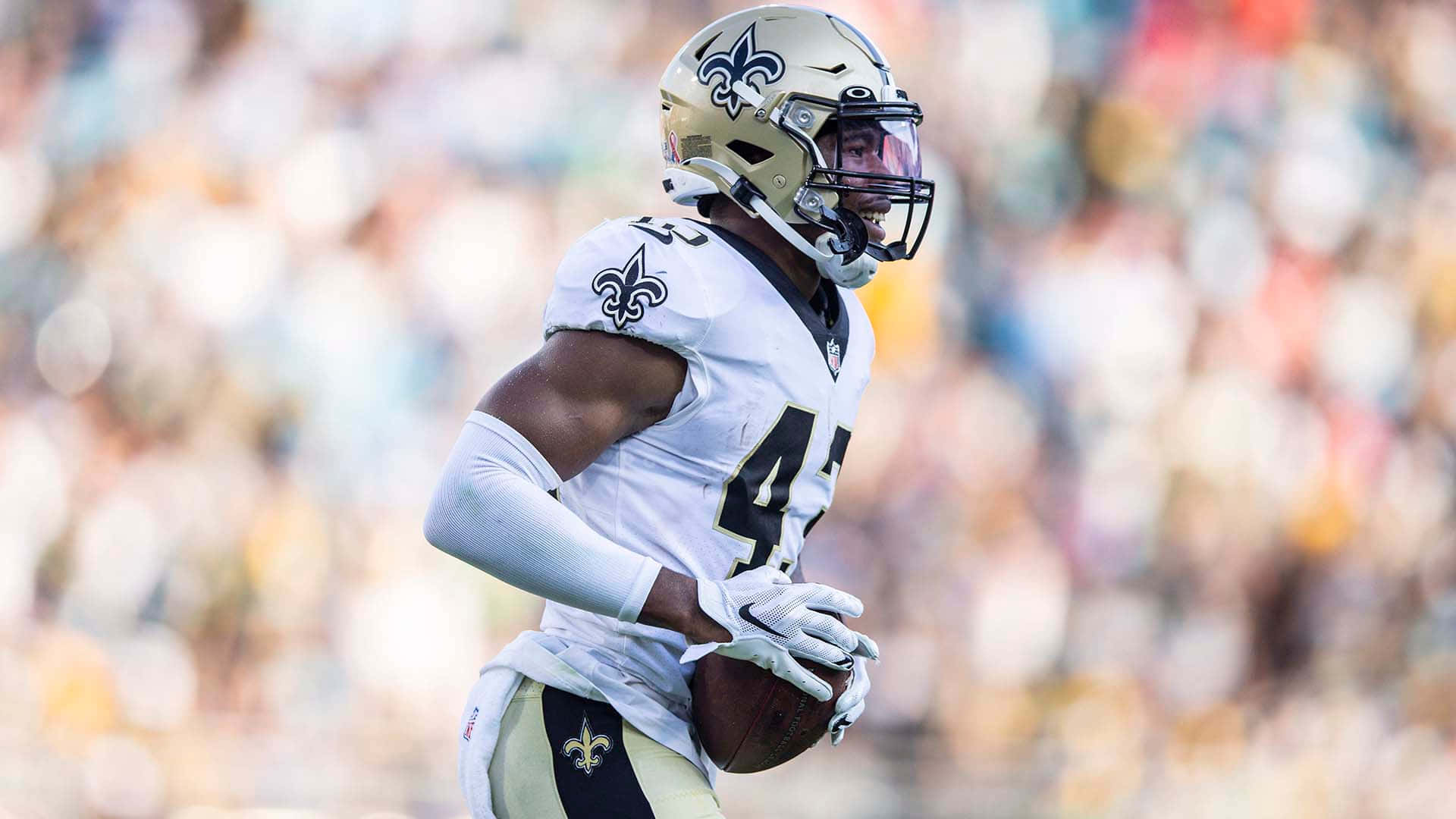 American Footballer Marcus Williams Side View Background