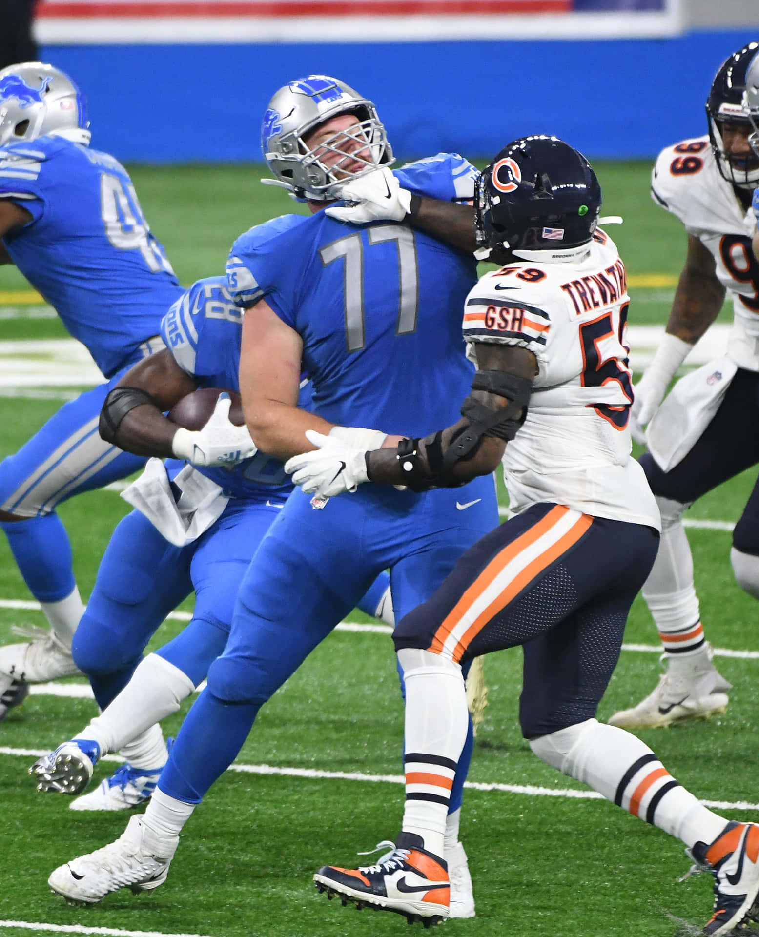 American Footballer No. 77 Frank Ragnow Background