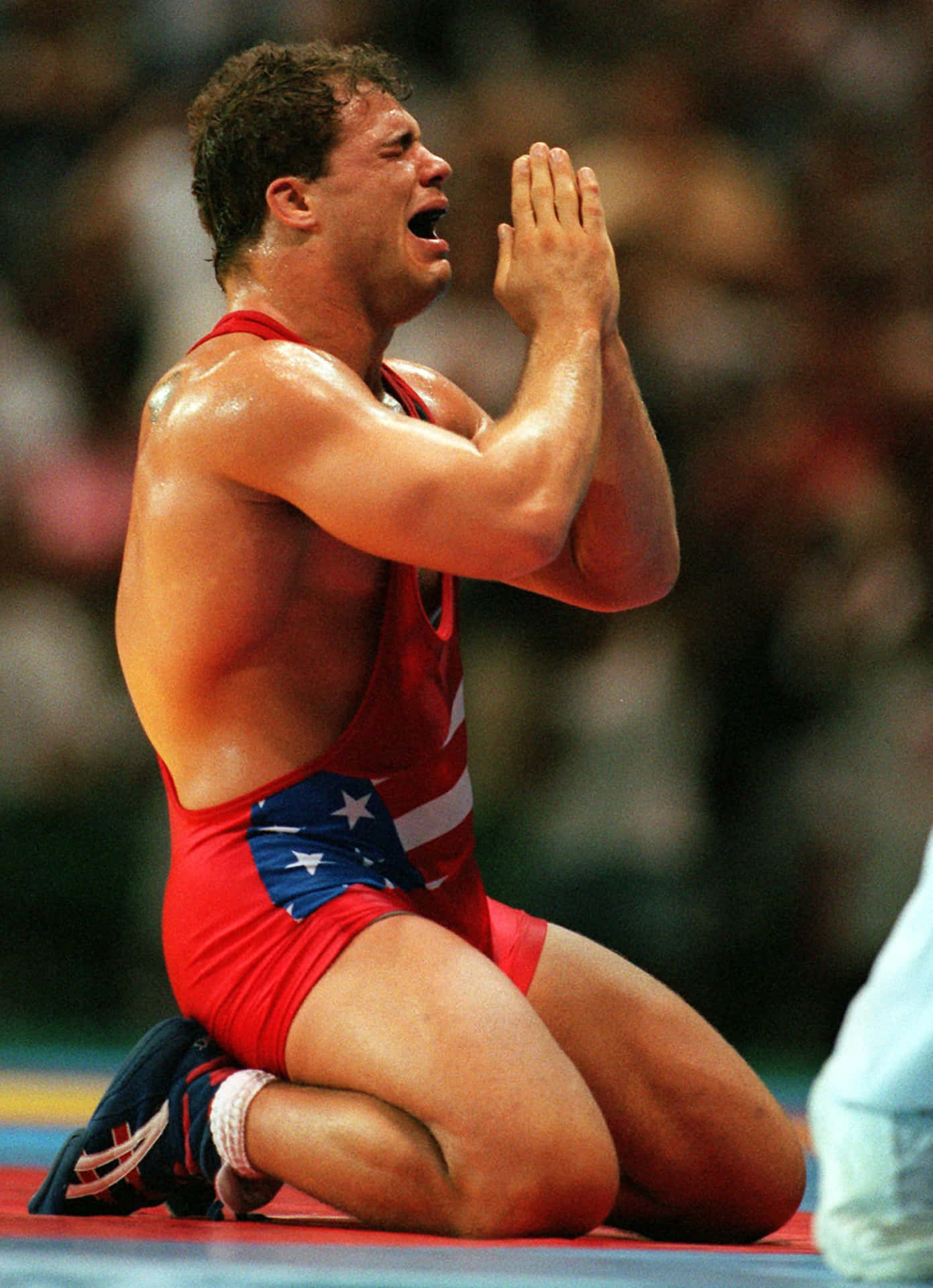 American Freestyle Wrestler Kurt Angle On His Knees Background