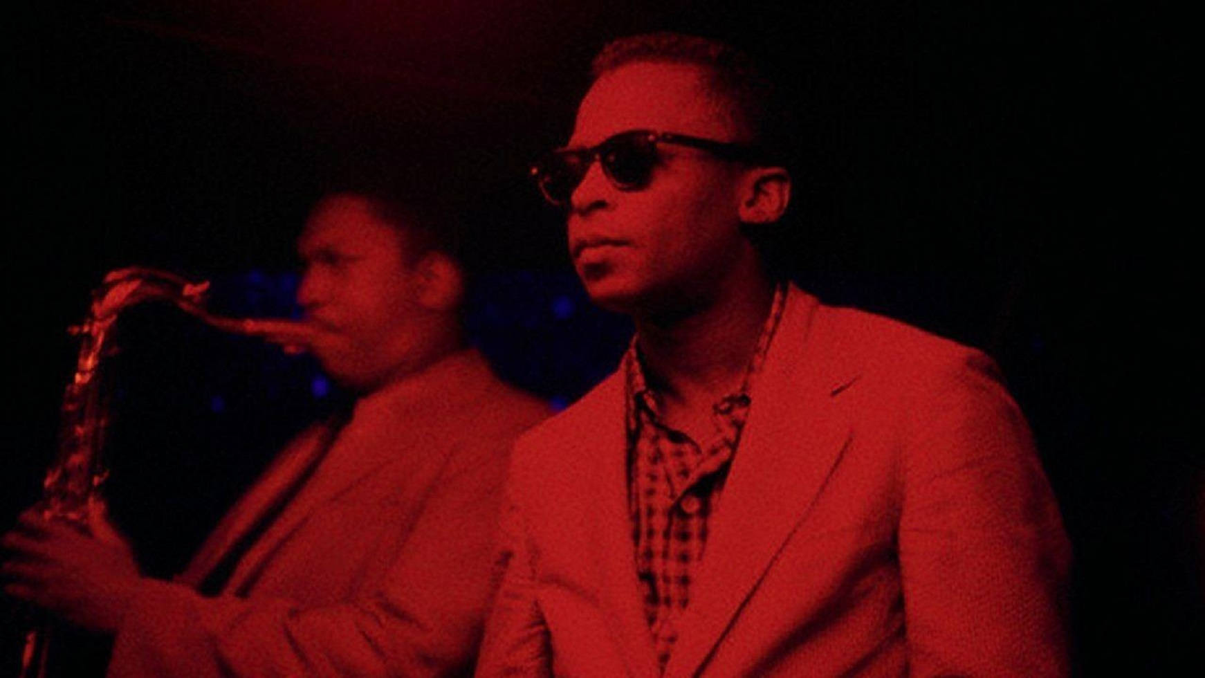 American Jazz Musicians John Coltrane And Miles Davis Background