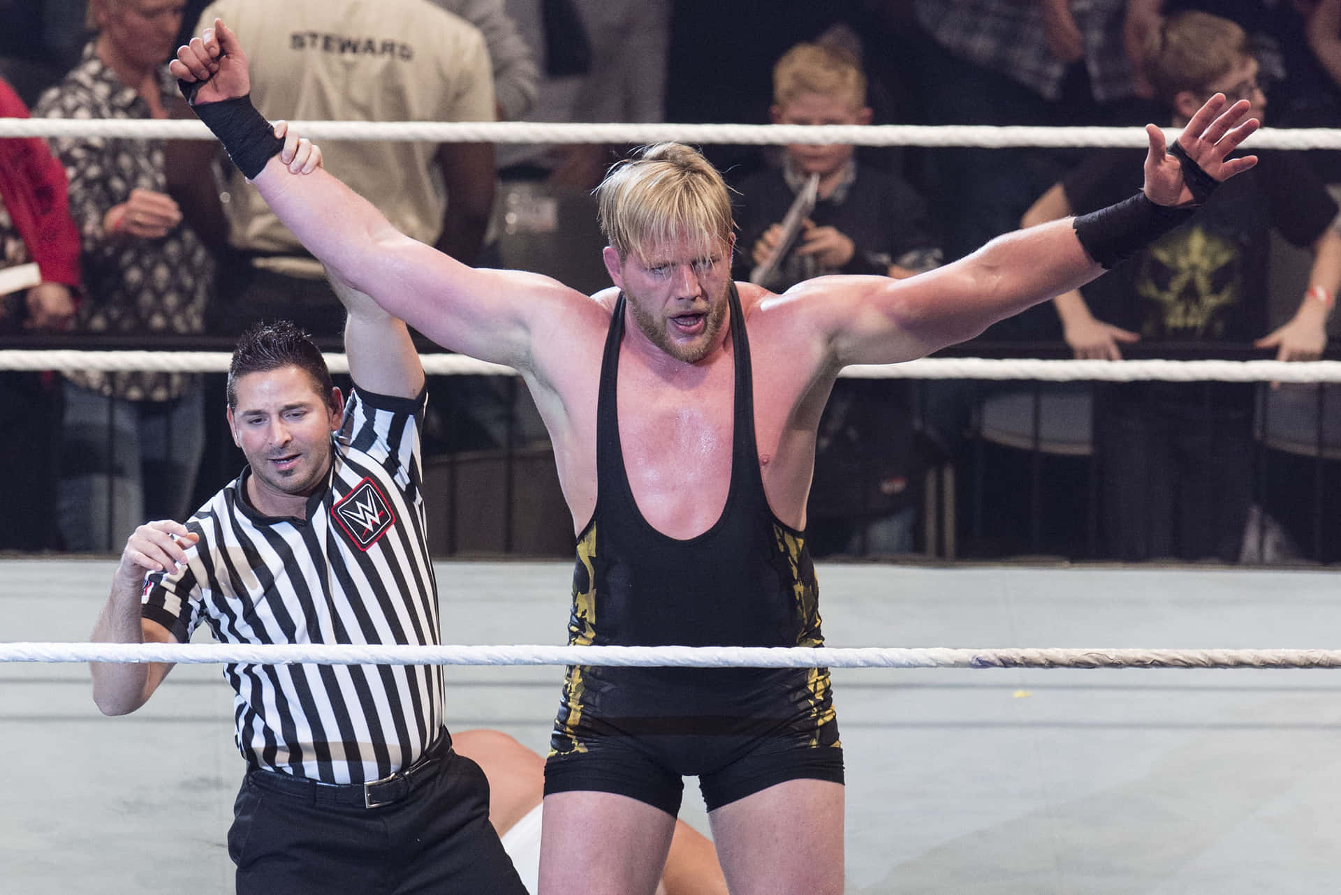 American Mixed Martial Artist And Wrestler Jake Hager With Referee Background