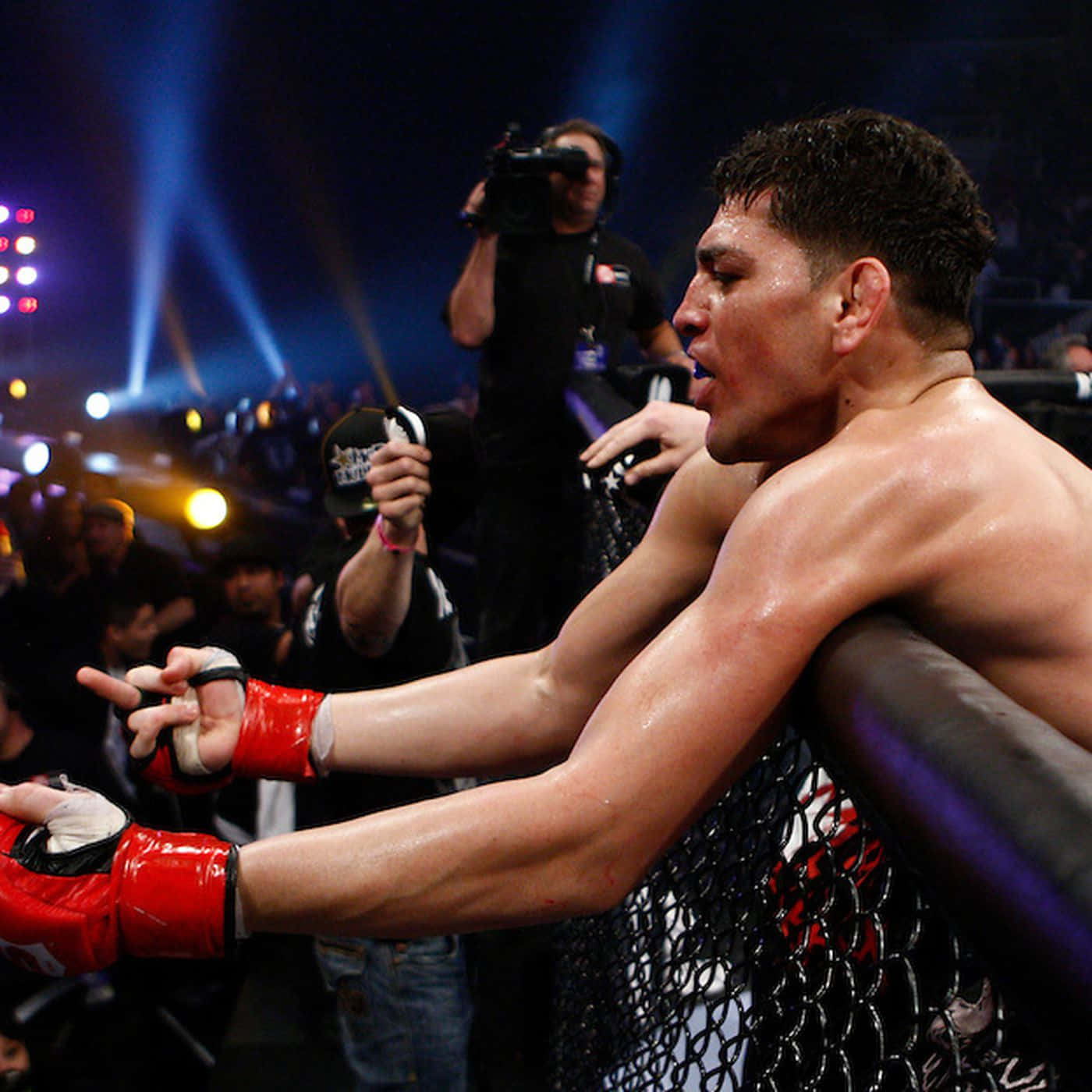 American Mixed Martial Artist Nick Diaz Giving The Finger Background