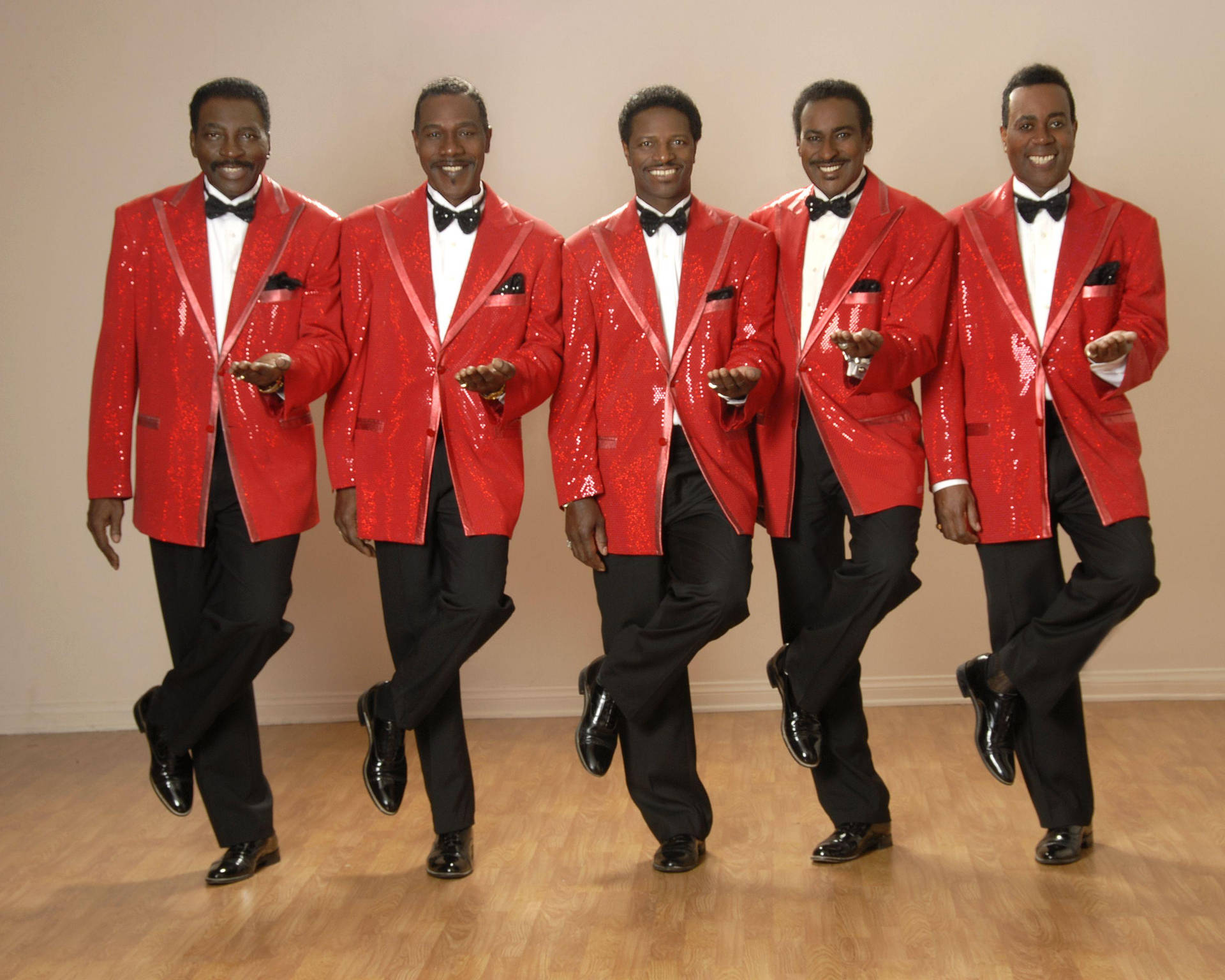 American Musical Group The Temptations Red Suit Vintage Shot Background