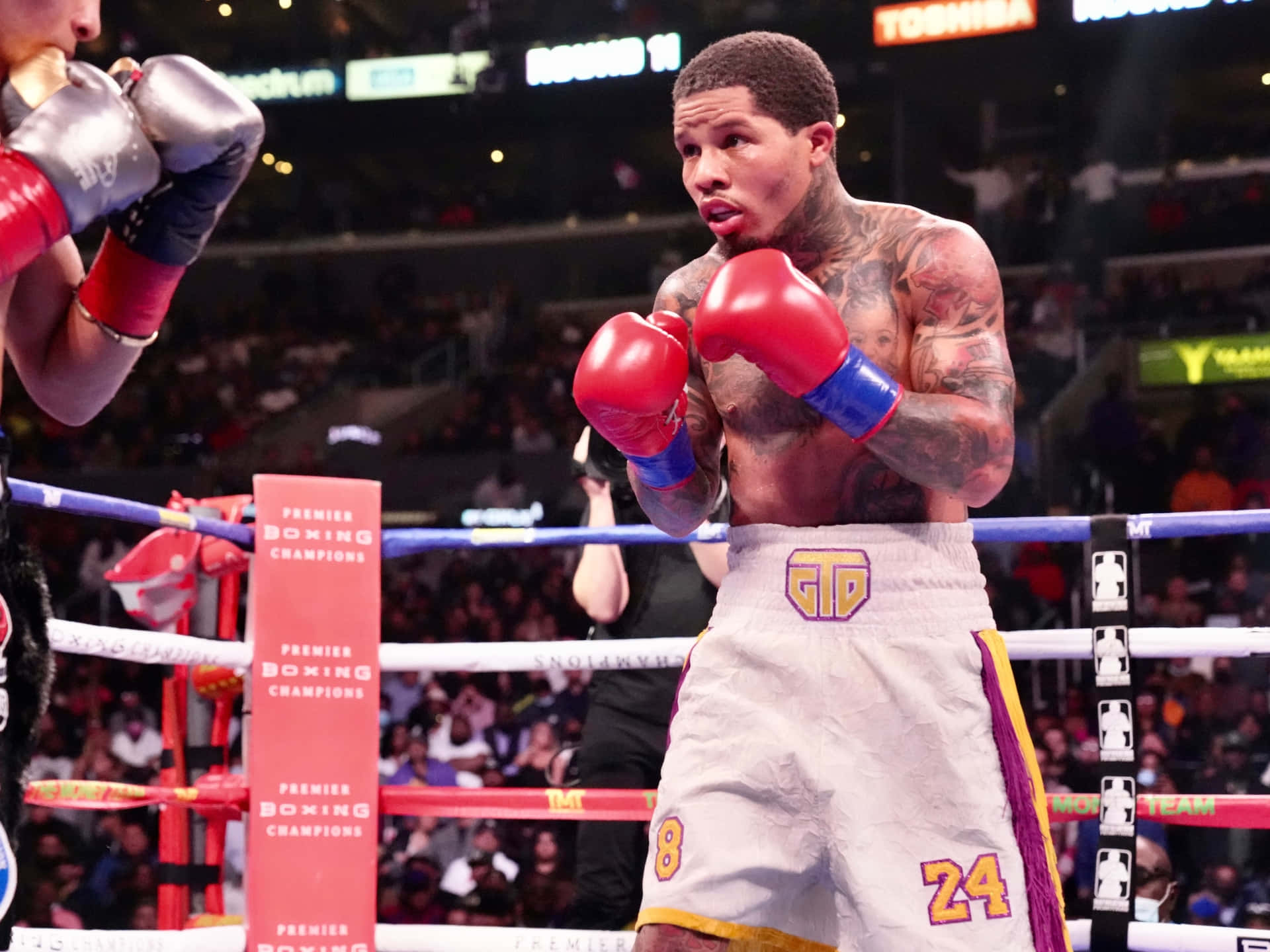 American Professional Boxer Gervonta Davis Challenges Opponents In The Ring Background