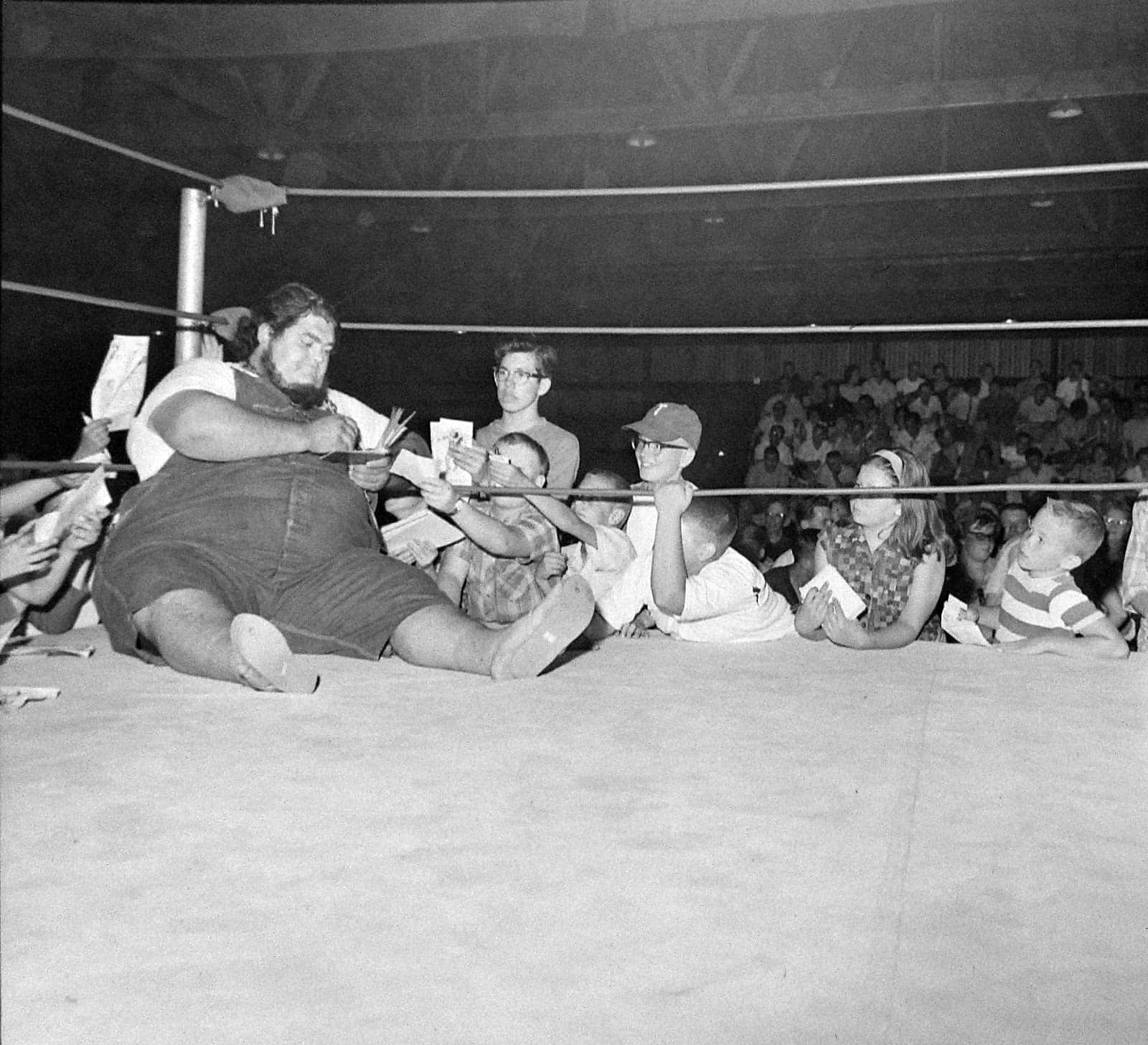 American Professional Wrestler Haystacks Calhoun Signing Autographs Background