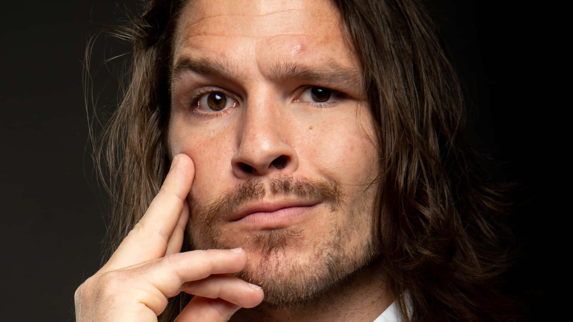 American Professional Wrestling Champion Dalton Castle Smirk Background