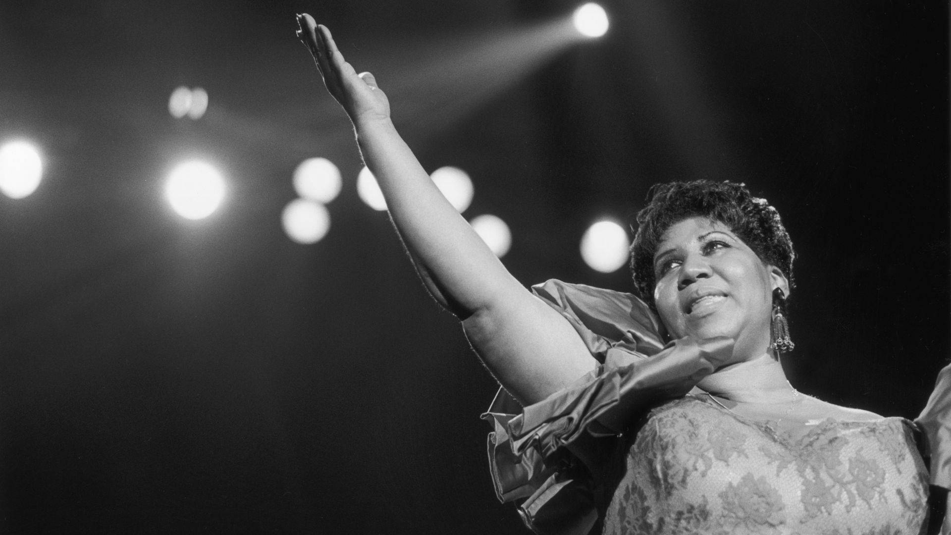 American Singer Aretha Franklin On The Stage Background