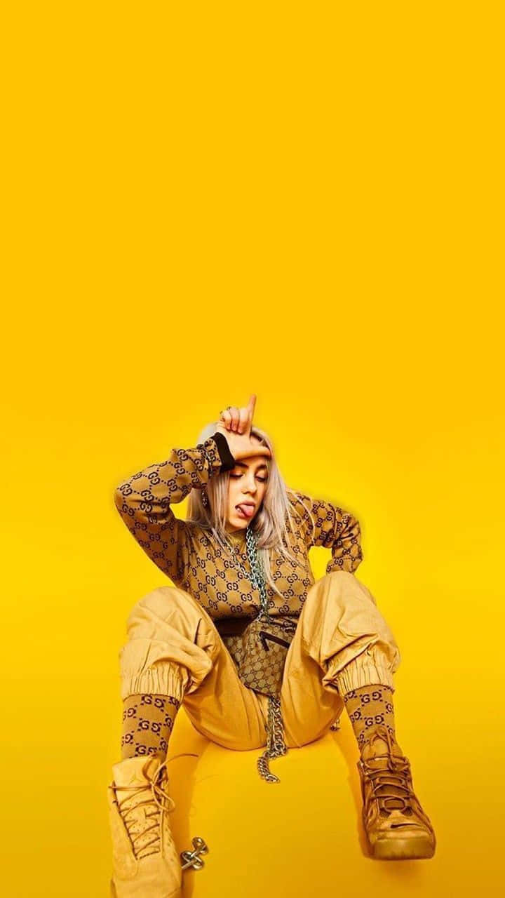 American Singer Billie Eilish Yellow Baddie Background