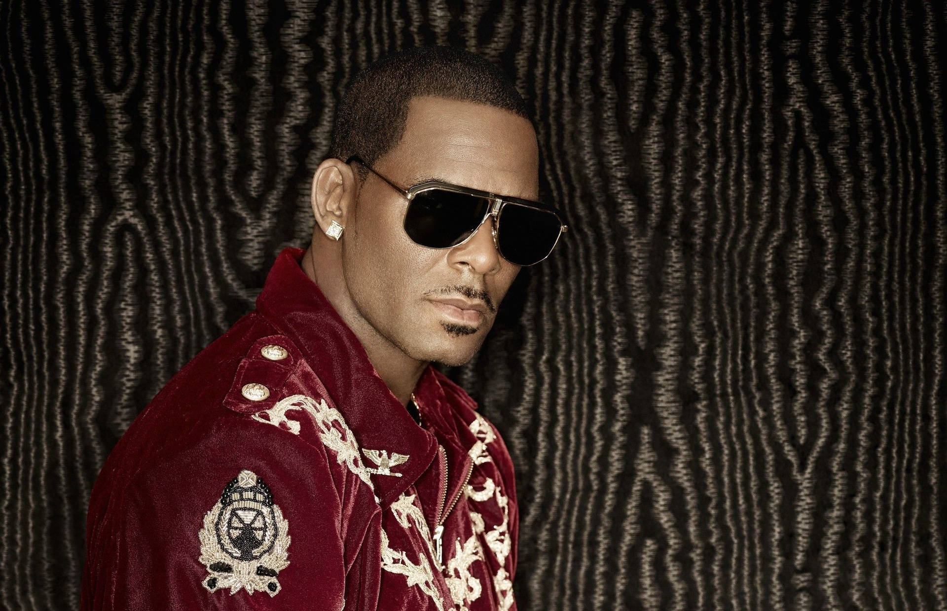 American Singer R Kelly In Red Jacket Background