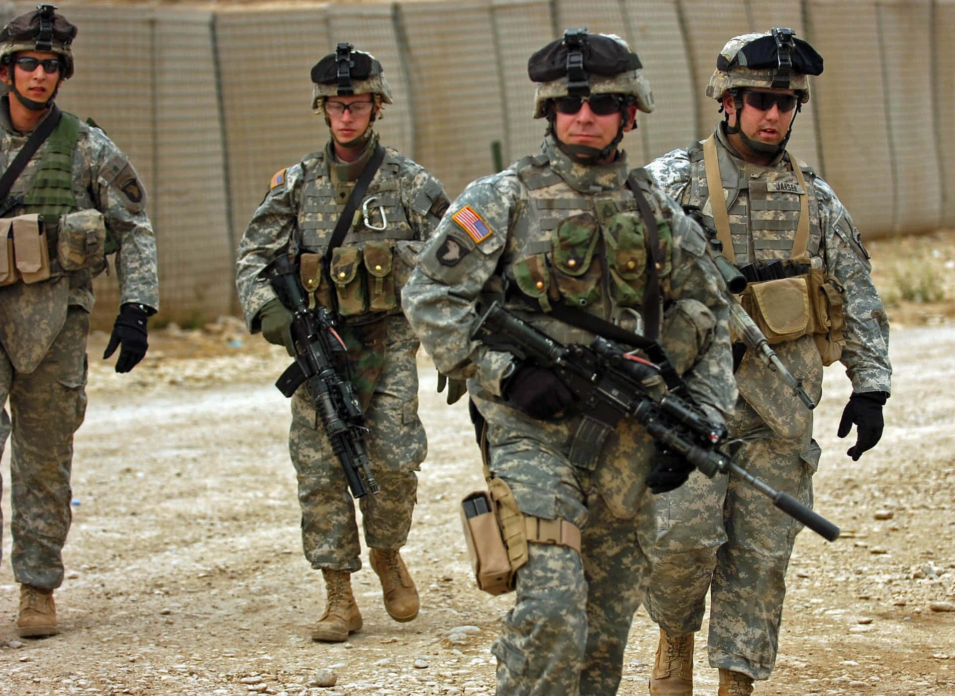 American Soldiers Proudly Flying The Us Flag Background
