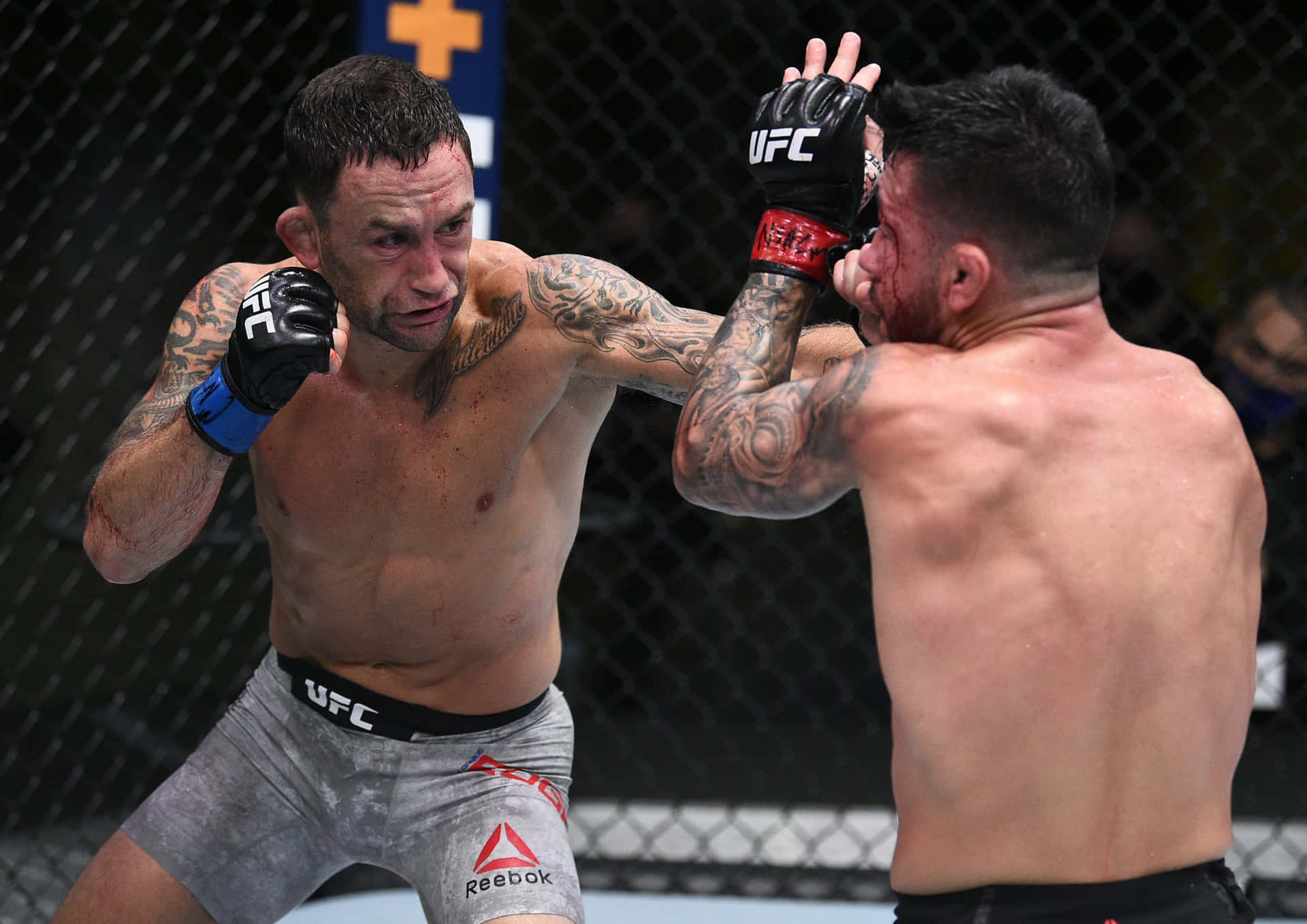 American Ufc Fighter Frankie Edgar Versus Pedro Munhoz Bloody Match Background