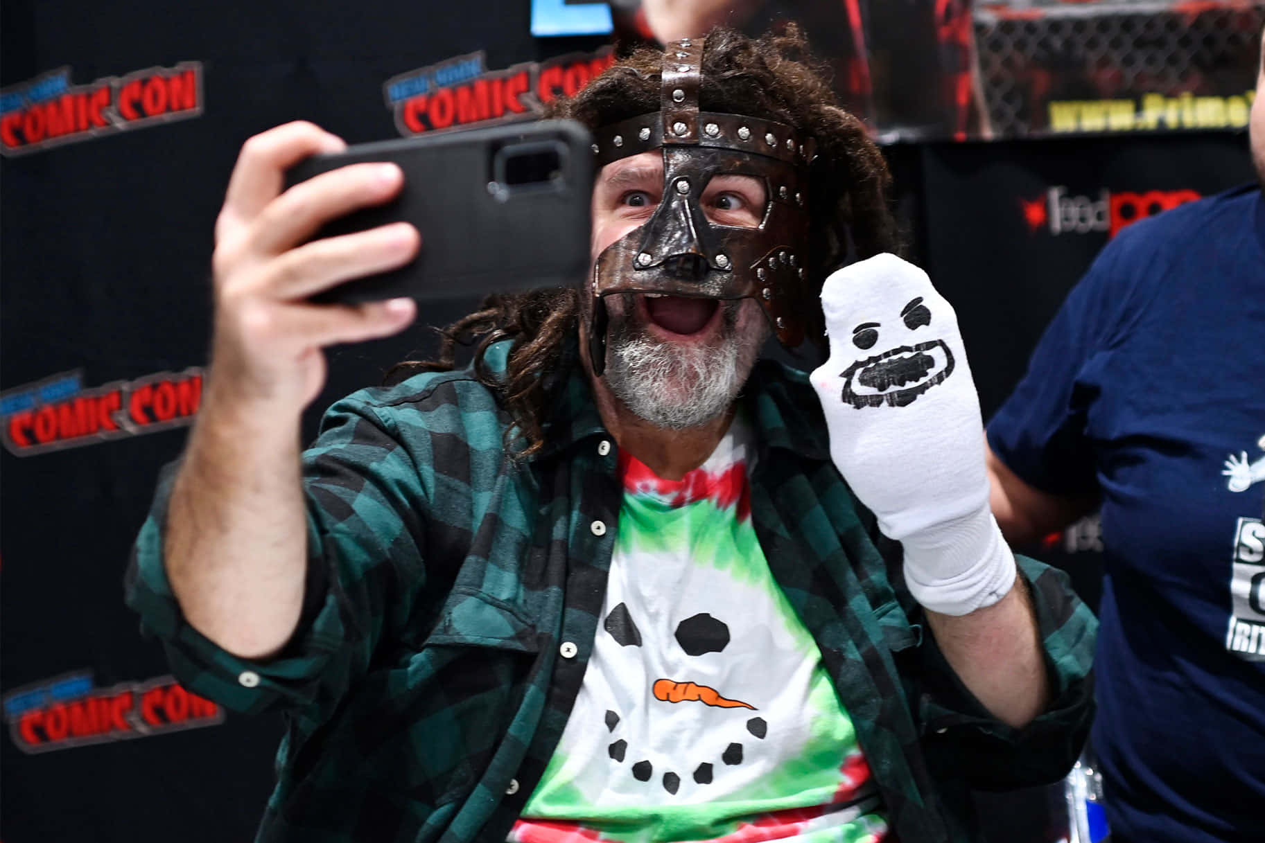 American Veteran Wrestler Mick Foley At 2022 Comic Con Background