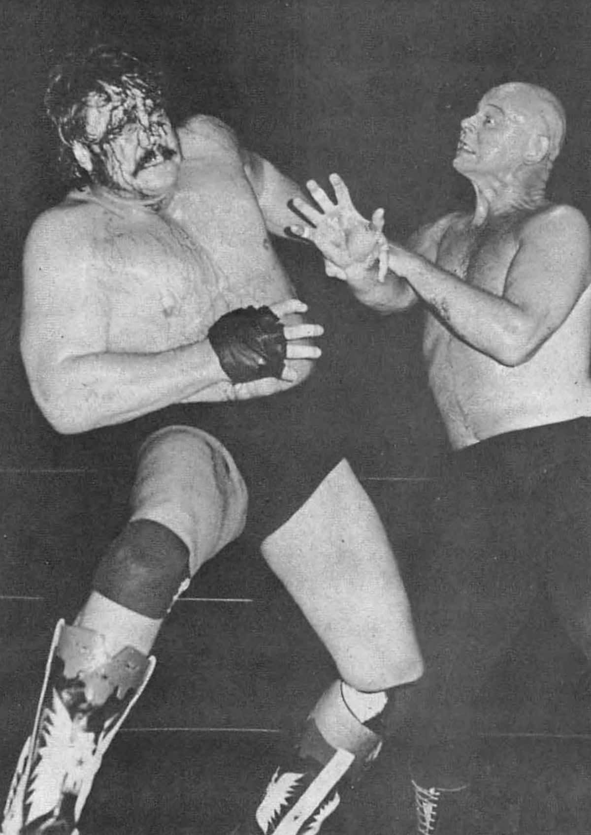 American Wrestler Baron Von Raschke Versus Blackjack Mulligan Background