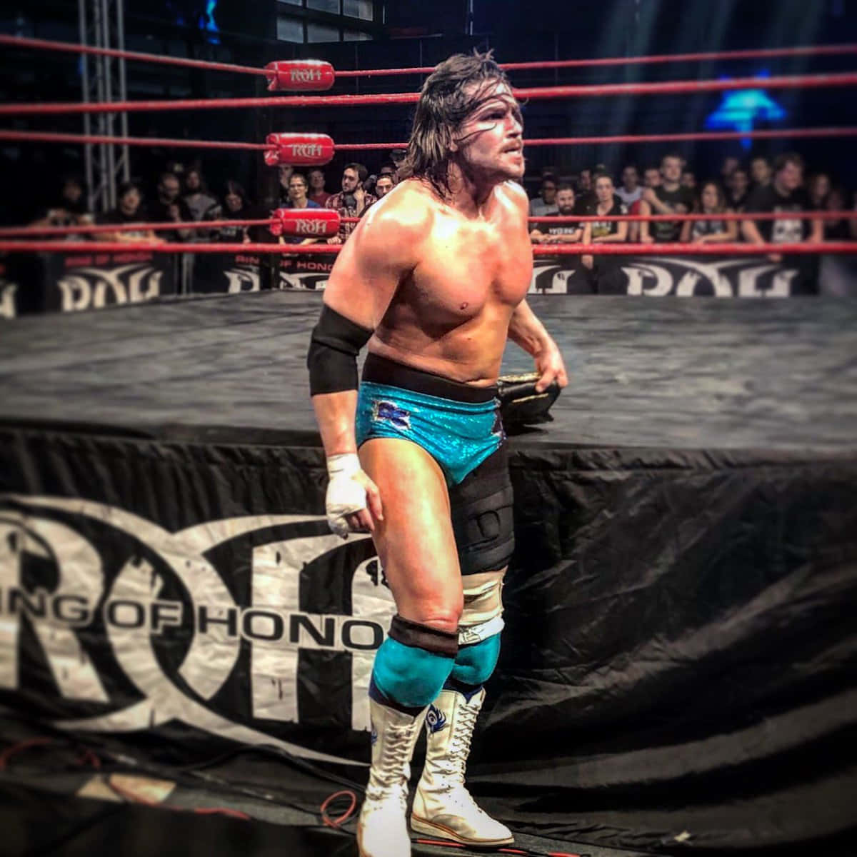 American Wrestler Dalton Castle Holding Championship Belt Background