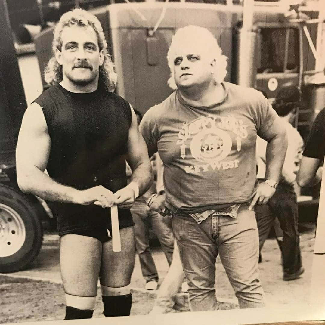 American Wrestler Magnum Ta And Dusty Rhodes Background