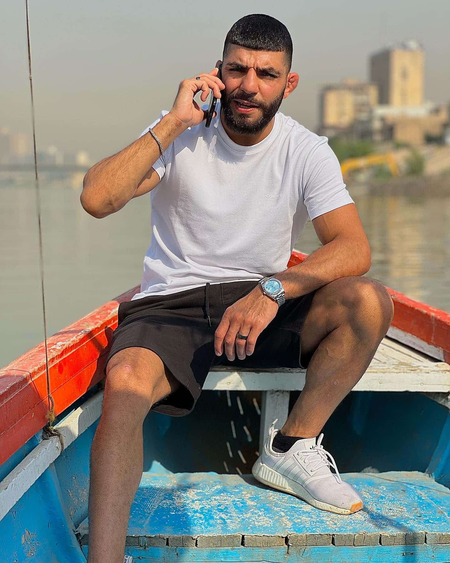 Amir Albazi Calling On Boat Background