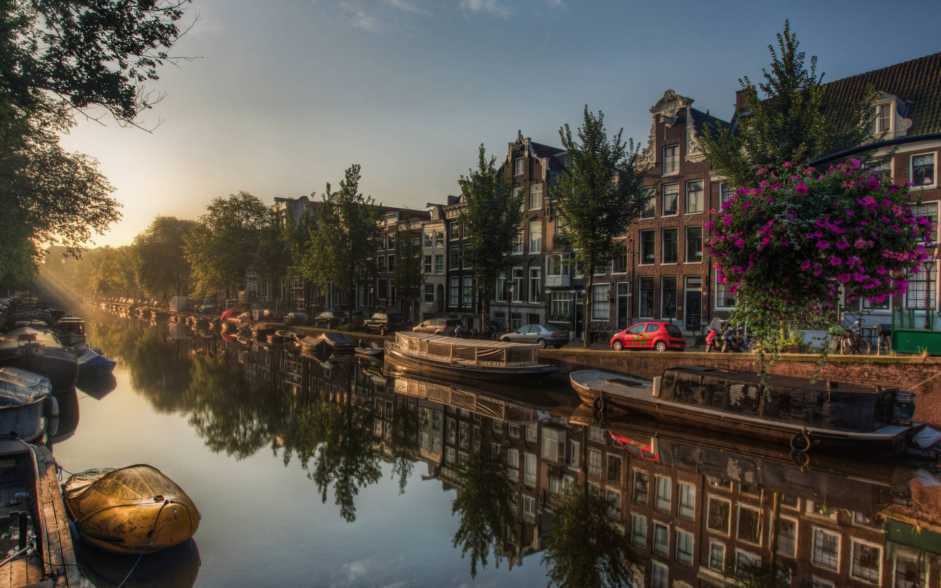 Amsterdam Netherlands Canal Houses In Sunrise Background