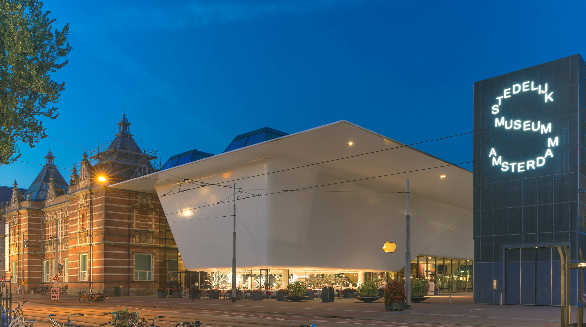 Amsterdam Stedelijk Museum At Evening Background