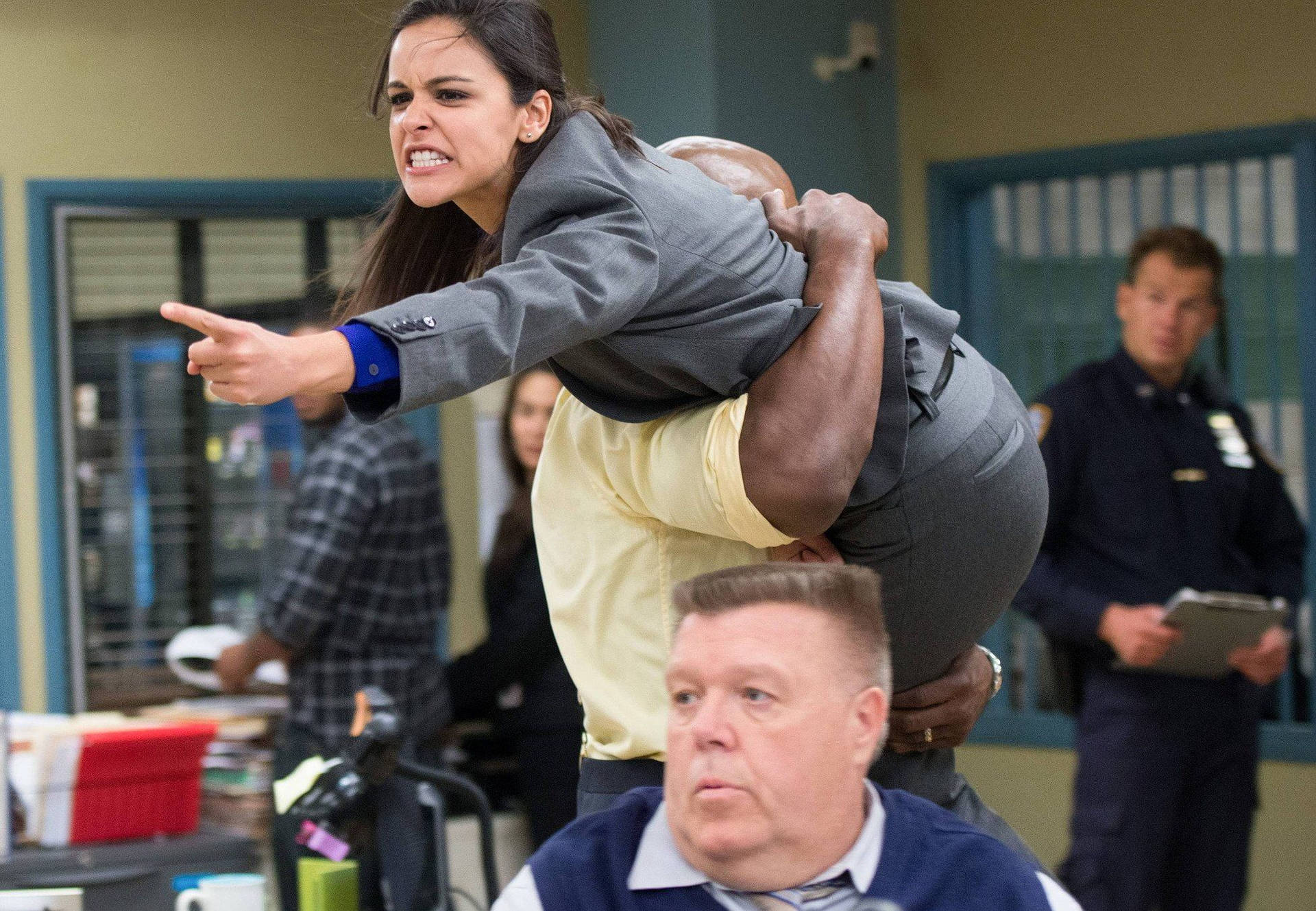Amy Santiago From Brooklyn Nine Nine Looking Angry. Background