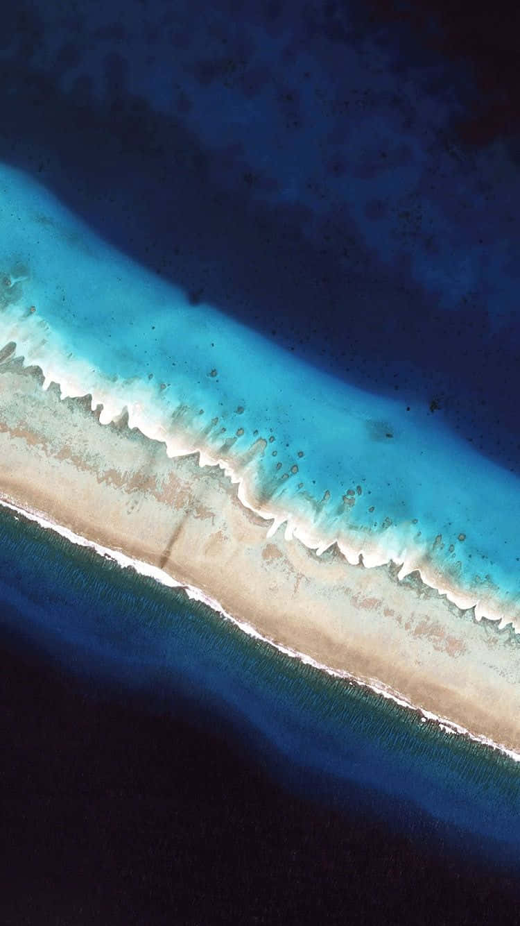 An Aerial View Of The Coral Reef In The Maldives Background