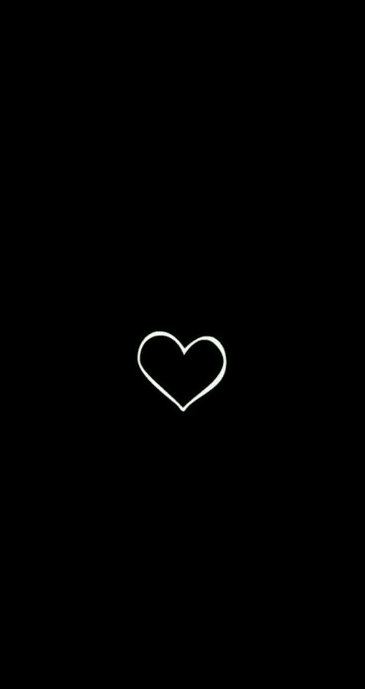 An Aesthetic Black Heart Shaped Against A Starry Night Sky Background