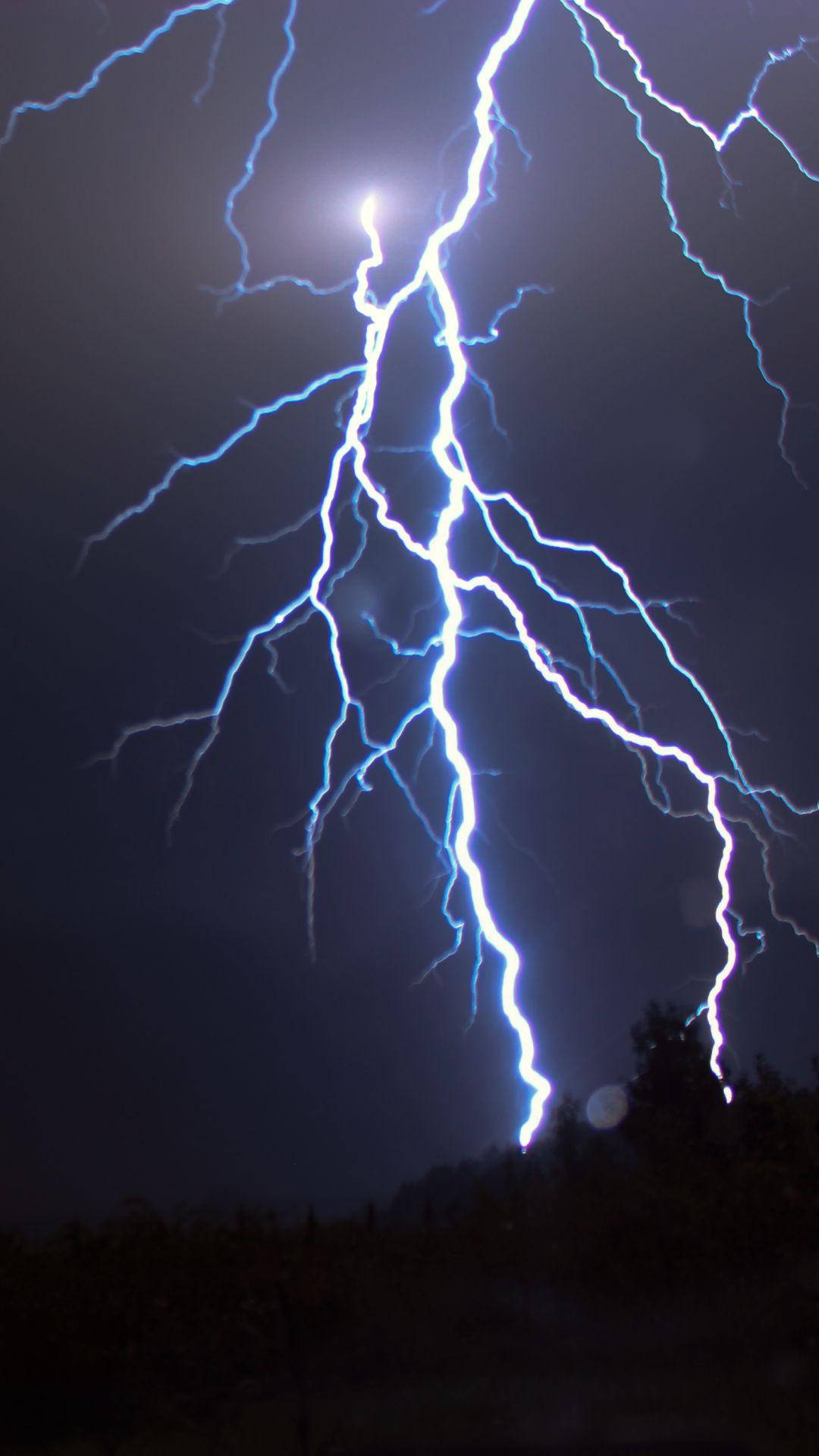 An Aesthetic Tale Of Lightning Across Skies Background