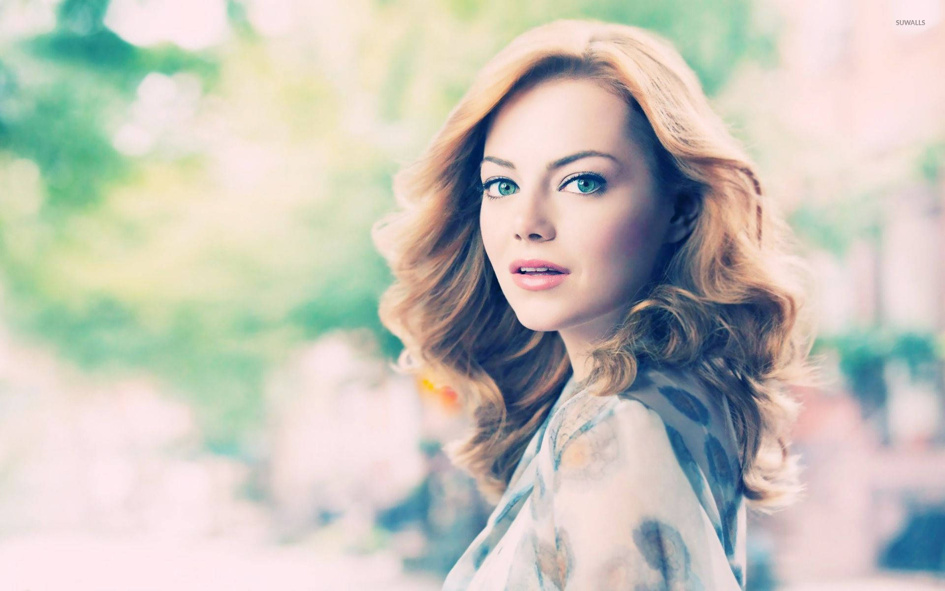An Alluring Portrait Of Emma Stone Background